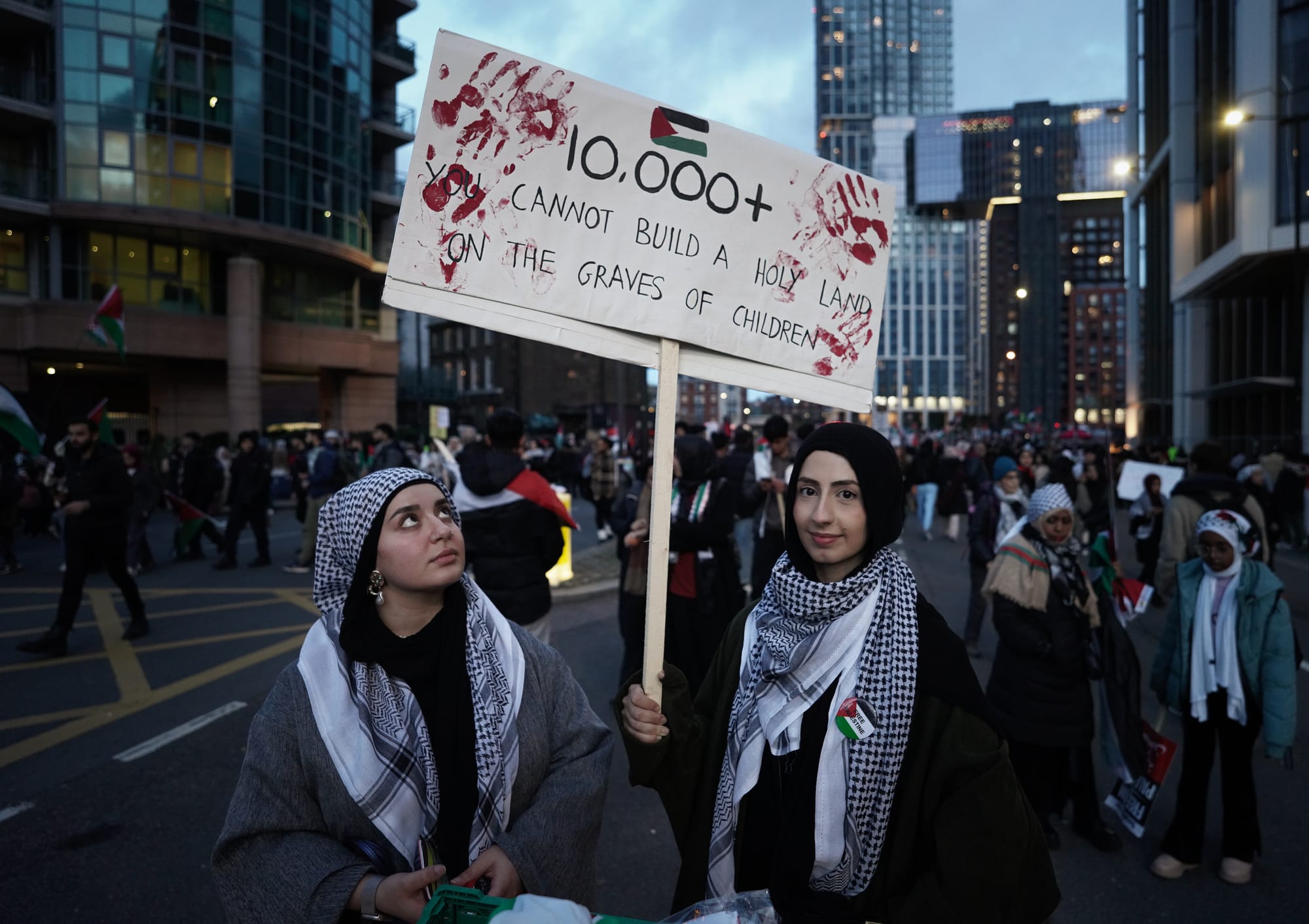 On Saturday 11 November, between 300,000 and 800,000 protesters marched from London's Hyde Park to the US Embassy in solidarity with Palestinians.  Britain's Home Secretary Suella Braverman had insisted a few days earlier that all those marching to call for a ceasefire, compassion and justice were hate marchers and she pressured the police to ban it.  Fortunately, common sense and the law prevailed, and the march was allowed to go ahead.   
It was not just a reaction to the indiscriminate bombing of Gaza, the escalating death toll and the blockade of essential supplies to the 2.3 million Palestinians living in the city and the surrounding strip.
It was also a determination to see an end to -
كما دعا المتظاهرون إلى إنهاء جميع العوامل الرئيسية التي تغذي الصراع.
1) An end to Palestinian suffering from 75 years of Israeli occupation. The Israeli occupation of the West Bank, East Jerusalem and the Gaza Strip since 1967 is officially recognised by the United Nations and most of the world despite the fact that the occupation is often ignored or sometimes even denied by Western media.  As Amnesty International reports Israeli occupation has resulted in "systematic human rights violations against Palestinians living there." 
نهاية معاناة الفلسطينيين من 75 عاما من الاحتلال الإسرائيلي. إن الاحتلال الإسرائيلي للضفة الغربية والقدس الشرقية وقطاع غزة منذ عام 1967 معترف به رسميًا من قبل الأمم المتحدة ومعظم دول العالم على الرغم من أن وسائل الإعلام الغربية غالبًا ما يتم تجاهل الاحتلال أو حتى إنكاره في بعض الأحيان. وكما أفادت منظمة العفو الدولية، فإن الاحتلال الإسرائيلي قد أدى إلى "انتهاكات منهجية لحقوق الإنسان ضد الفلسطينيين الذين يعيشون هناك".
<a href="https://www.amnesty.org/en/latest/campaigns/2017/06/israel-occupation-50-years-of-dispossession/" rel="noreferrer nofollow">www.amnesty.org/en/latest/campaigns/2017/06/israel-occupa...</a> 
2) An end to Palestinians living under a highly restrictive Apartheid regime as recognised by Amnesty International, Human Rights Watch and War on Want. Across the West Bank Palestinians are banned from driving on numerous roads that cross the region and as War on Want explains "Jewish Israelis and Palestinians are treated differently in almost every aspect of life: housing, education, health, employment, family life, residence and freedom of movement. Dozens of Israeli laws and policies institutionalise this prevailing system of racial discrimination and domination." 
وضع حد للفلسطينيين الذين يعيشون في ظل نظام فصل عنصري شديد التقييد كما اعترفت به منظمة العفو الدولية وهيومن رايتس ووتش ومنظمة الحرب على العوز. في جميع أنحاء الضفة الغربية، يُمنع الفلسطينيون من القيادة على العديد من الطرق التي تعبر المنطقة، وكما توضح مؤسسة "الحرب على العوز" الخيرية، "يتم التعامل مع اليهود الإسرائيليين والفلسطينيين بشكل مختلف في كل جانب من جوانب الحياة تقريبًا: السكن والتعليم والصحة والتوظيف والأسرة". الحياة والإقامة وحرية التنقل.. عشرات القوانين والسياسات الإسرائيلية تضفي الطابع المؤسسي على هذا النظام السائد من التمييز العنصري والسيطرة.
<a href="https://waronwant.org/news-analysis/israeli-apartheid-factsheet?gclid=Cj0KCQjwm66pBhDQARIsALIR2zDcaufbcTHN6VSg9L71b4Z5DjpgFHl5SJboso9xjAvA_3F0MiRzKS4aAs4REALw_wcB" rel="noreferrer nofollow">waronwant.org/news-analysis/israeli-apartheid-factsheet?g...</a>
3) An end to restrictions on movement.  Across the West Bank there are some 650 Israeli military checkpoints through which only some Palestinians are allowed to pass, often with humiliating questioning and delays, so that they can travel to other towns whether to visit families, seeking medical treatment or for any other reason. In Gaza, travel is even more difficult and only a tiny minority with work permits have been allowed to cross the border - the rest have to remain in what is often described as the world's largest open air prison - the densely populated Gaza strip housing some 2.3 million people.  
إنهاء القيود المفروضة على الحركة. يوجد في جميع أنحاء الضفة الغربية حوالي 650 نقطة تفتيش عسكرية إسرائيلية لا يُسمح إلا لبعض الفلسطينيين بالمرور من خلالها، مع استجواب وتأخير مهين، حتى يتمكنوا من السفر إلى مدن أخرى سواء لزيارة عائلاتهم أو طلب العلاج الطبي أو لأي سبب آخر. وفي غزة، يعد السفر أكثر صعوبة ولم يُسمح إلا لأقلية صغيرة من حاملي تصاريح العمل بعبور الحدود - أما الباقون فيجب أن يبقوا في ما يوصف في كثير من الأحيان بأنه أكبر سجن مفتوح في العالم - وهو قطاع غزة المكتظ بالسكان والذي يضم حوالي 2.3 نسمة. مليون شخص.
3) An end to the 16 years of siege imposed by Israel on Gaza which means that around 56% of children were suffering from anemia and only 4% had access to safe drinking water even before the outbreak of conflict this month.  
إنهاء الحصار الذي تفرضه إسرائيل على غزة منذ 16 عاماً. ويعني الحصار أن حوالي 56% من الأطفال كانوا يعانون من فقر الدم وأن 4% فقط كانوا يحصلون على مياه الشرب الآمنة حتى قبل اندلاع النزاع هذا الشهر.
<a href="https://www.unicef.org/sop/what-we-do/wash-water-sanitation-and-hygiene#:~:text=As 96 per cent of,is the desalination of seawater" rel="noreferrer nofollow">www.unicef.org/sop/what-we-do/wash-water-sanitation-and-h...</a>.
<a href="https://www.ncbi.nlm.nih.gov/pmc/articles/PMC4391478/" rel="noreferrer nofollow">www.ncbi.nlm.nih.gov/pmc/articles/PMC4391478/</a>
4) The never ending process of Israeli expansion across Palestinian land, including the demolition of 55,000 Palestinian homes since 1967, occurring on a near monthly basis as well as the cutting down of fields of olive trees and the ploughing up of Palestinian farms to make room for yet more illegal settlements subsidised by the Israeli government.
These settlements are illegal under international law, which rightly recognises the 1967 border. However, since 1967, Israel has constructed 250 of them across the West Bank in which over 633,000 Israelis live in subsidised and often luxurious housing with swimming pools and manicured lawns, an unimaginable privilege to the vast majority of Palestinians. 
وضع حد للتوسع الإسرائيلي الذي لا ينتهي عبر الأراضي الفلسطينية، بما في ذلك هدم 55.000 منزل فلسطيني منذ عام 1967، والذي يحدث على أساس شهري تقريبًا، فضلاً عن قطع حقول أشجار الزيتون وحراثة المزارع الفلسطينية. وترتكب هذه الجرائم ضد الفلسطينيين لإفساح المجال أمام إقامة المستوطنات الإسرائيلية غير القانونية التي تدعمها الحكومة الإسرائيلية
ومن الواضح أن المستوطنات غير قانونية بموجب القانون الدولي، الذي يعترف بحق بحدود عام 1967. ومع ذلك، منذ عام 1967، شيدت إسرائيل 250 منها في جميع أنحاء الضفة الغربية، حيث يعيش أكثر من 633 ألف إسرائيلي في مساكن مدعومة وفاخرة في كثير من الأحيان مع حمامات سباحة ومروج مشذبة، وهو امتياز لا يمكن تصوره لجميع الفلسطينيين تقريبًا.
<a href="https://icahd.org/2020/03/15/end-home-demolitions-an-introduction/" rel="noreferrer nofollow">icahd.org/2020/03/15/end-home-demolitions-an-introduction/</a> 
<a href="https://www.ochaopt.org/sites/default/files/westbank_a0_25_06_2020_final.pdf" rel="noreferrer nofollow">www.ochaopt.org/sites/default/files/westbank_a0_25_06_202...</a>
5) Never ending acts of settler terrorism against Palestinians.  Western media rightly condemns occasional Palestinian attacks on Israeli civilians, including the appalling atrocities committed by Hamas on 7 October.  However, for years illegal Israeli settlers in the West Bank have staged attacks against Palestinians, sometimes motivated sheerly by hatred, but often by the desire to inflict terror and to ethnically cleanse an area.  The most recent incident was an attack on Wednesday 11 October in which masked settlers killed three Palestinian villagers and then killed a Palestinian father and son attending the funeral the next day. 
وضع حد لأعمال الإرهاب التي يمارسها المستوطنون ضد الفلسطينيين. وتدين وسائل الإعلام الغربية عن حق الهجمات الفلسطينية العرضية على المدنيين الإسرائيليين، بما في ذلك الفظائع المروعة التي ارتكبتها حماس في 7 تشرين الأول/أكتوبر. ومع ذلك، ظل المستوطنون الإسرائيليون غير الشرعيين في الضفة الغربية لسنوات يشنون هجمات ضد الفلسطينيين، بدافع الكراهية في بعض الأحيان، ولكن في كثير من الأحيان بسبب التصميم على ترويع الفلسطينيين وتطهيرهم عرقيًا من منطقة ما. وكانت آخر الحوادث هي الهجوم الذي وقع يوم الأربعاء 11 تشرين الأول/أكتوبر، حيث قتل مستوطنون ملثمون ثلاثة قرويين فلسطينيين ثم قتلوا أبًا فلسطينيًا وابنه كانا يحضران الجنازة في اليوم التالي.
<a href="https://theintercept.com/2023/10/13/israel-settlers-gaza-palestinians-west-bank/" rel="noreferrer nofollow">theintercept.com/2023/10/13/israel-settlers-gaza-palestin...</a>
<a href="https://arabcenterdc.org/resource/the-dynamics-of-israeli-settler-terrorism-and-us-options/" rel="noreferrer nofollow">arabcenterdc.org/resource/the-dynamics-of-israeli-settler...</a>
6) The division of Palestinian land by the separation wall.  The 708 km Separation Wall, completed in 2005, was supposedly built to protect Israel from any Palestinians that might be able to enter the country without permission, but 85% of it runs up to 18 km inside the internationally recognised 1967 boundary ("Green Line"), frequently dividing Palestinians villagers from their farmland as well as running through the middle of farms and dividing arable land from key water supplies.  
Some 10% of the West Bank now lies between the wall and the 1967 border, an area into which everyone, except Palestinians, is allowed entry. Not surprisingly, the International Court of Justice has issued an advisory opinion that the separation wall is a contravention of international law and in 2003 the UN General Assembly passed a resolution demanding its removal by 144 votes to just 4.  Analysts also fear that the wall acts as a de facto annexation of all the Palestinian land that lies to the west of it.
<a href="https://en.wikipedia.org/wiki/Israeli_West_Bank_barrier" rel="noreferrer nofollow">en.wikipedia.org/wiki/Israeli_West_Bank_barrier</a>
7) The myth of Palestinian rejectionism. Western mainstream media usually maintains falsely that it is Palestinians that have constantly rejected a two-state solution, whereas the opposite is the case.  Arab states and the Palestinians have frequently made clear their willingness to negotiate a future two-state solution on the basis of the 1967 frontiers, while Israel is committed to preventing any such solution and continuing its territorial expansion.  
As early as 1976, Egypt, Syria and Jordan presented a two-state solution resolution to the UN Security Council based on the 1967 Green Line (in accordance with the international consensus) but it was vetoed outright by the United States, even though Washington at the time publicly acknowledged the illegality of all Israeli settlements across the Palestinian West Bank.  
The same happened again in 1980.   
Later in 1988, the PLO put forward their position in a declaration by the Palestinian National Council calling for a Palestinian state alongside Israel with guarantees of security to both countries.  However in May 1989, Israel's Likud-Labour coalition government made it crystal clear that they would not accept an "additional" Palestinian state between Jordan and Israel, regardless of what Jordanians, Palestinians or the rest of the world might think.  The founding charter of Benjamin Netanyahu's Likud Party still "flatly rejects the establishment of a Palestinian state west of the Jordan river."  
<a href="https://en.wikipedia.org/wiki/Likud" rel="noreferrer nofollow">en.wikipedia.org/wiki/Likud</a>
8) The frequent killing by Israeli security forces of peaceful protesters, women, children, journalists and medics, including the assassination of renowned Al Jazeera correspondent Shireen Abu Akleh in May last year.  In the nine months of 2023 prior to 7 October,  248 Palestinians, 40 of them children, had been killed by Israeli soldiers, but these deaths attracted almost no attention in the Western media.  Palestinian lives have always been very cheap.  
<a href="https://www.youtube.com/watch?v=KMIZTiN-TrE" rel="noreferrer nofollow">www.youtube.com/watch?v=KMIZTiN-TrE</a>
9) The current refusal of Israel to allow any journalists into the Gaza Strip so they can see and report on, obviously at their own risk, the destruction and casualties and suffering of the civilian population.
10) An end to "administrative detentions" across the West  Bank under which thousands of Palestinians have been detained without any right to be told under what charges they are being held, let alone any right to a free trial. As the Israeli human rights organisation B'Tselem explains 
"Administrative detention is incarceration without trial or charge, alleging that a person plans to commit a future offense. It has no time limit, and the evidence on which it is based is not disclosed. Israel employs this measure extensively and routinely, and has used it to hold thousands of Palestinians for lengthy periods of time. While detention orders are formally reviewed, this is merely a semblance of judicial oversight, as detainees cannot reasonably mount a defense against undisclosed allegations. Nevertheless, courts uphold the vast majority of orders."  
<a href="https://www.btselem.org/topic/administrative_detention" rel="noreferrer nofollow">www.btselem.org/topic/administrative_detention</a>
11) An end to Israeli soldiers controlling access to and frequently preventing Muslims from visiting the Al Aqsa Mosque in Israeli occupied East Jerusalem [Al Quds],  considered the third holiest site in Islam after Mecca and Medina.  On several occasions, Israeli troops and/or police have also attacked worshippers using batons, stun grenades and tear gas, igniting understandable anger across the Islamic World.  Radical Israeli settlers also sometimes enter under the protection of Israeli security forces and some also perform Jewish rituals in contravention of current agreements about non-Muslims being allowed in, but only as visitors. 
<a href="https://www.newarab.com/news/israeli-settlers-storm-aqsa-compound-under-police-protection" rel="noreferrer nofollow">www.newarab.com/news/israeli-settlers-storm-aqsa-compound...</a>

<a href="https://www.aljazeera.com/news/2019/3/12/israeli-police-assault-worshippers-close-al-aqsa-compound" rel="noreferrer nofollow">www.aljazeera.com/news/2019/3/12/israeli-police-assault-w...</a>