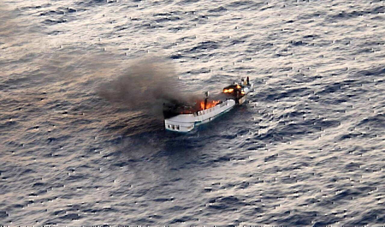 PACIFIC OCEAN (April 21, 2012) A fire burns aboard the Taiwanese fishing vessel Shin Maan Chun in the Pacific Ocean. The fire forced the crew of nine to abandon ship and through a coordinated effort between the U.S. 7th Fleet and U.S. Coast Guard Sector Guam, all of the fishermen were safely rescued and brought aboard the Marshallese-flagged bulk carrier Semirio. (U.S. Navy photo/Released)