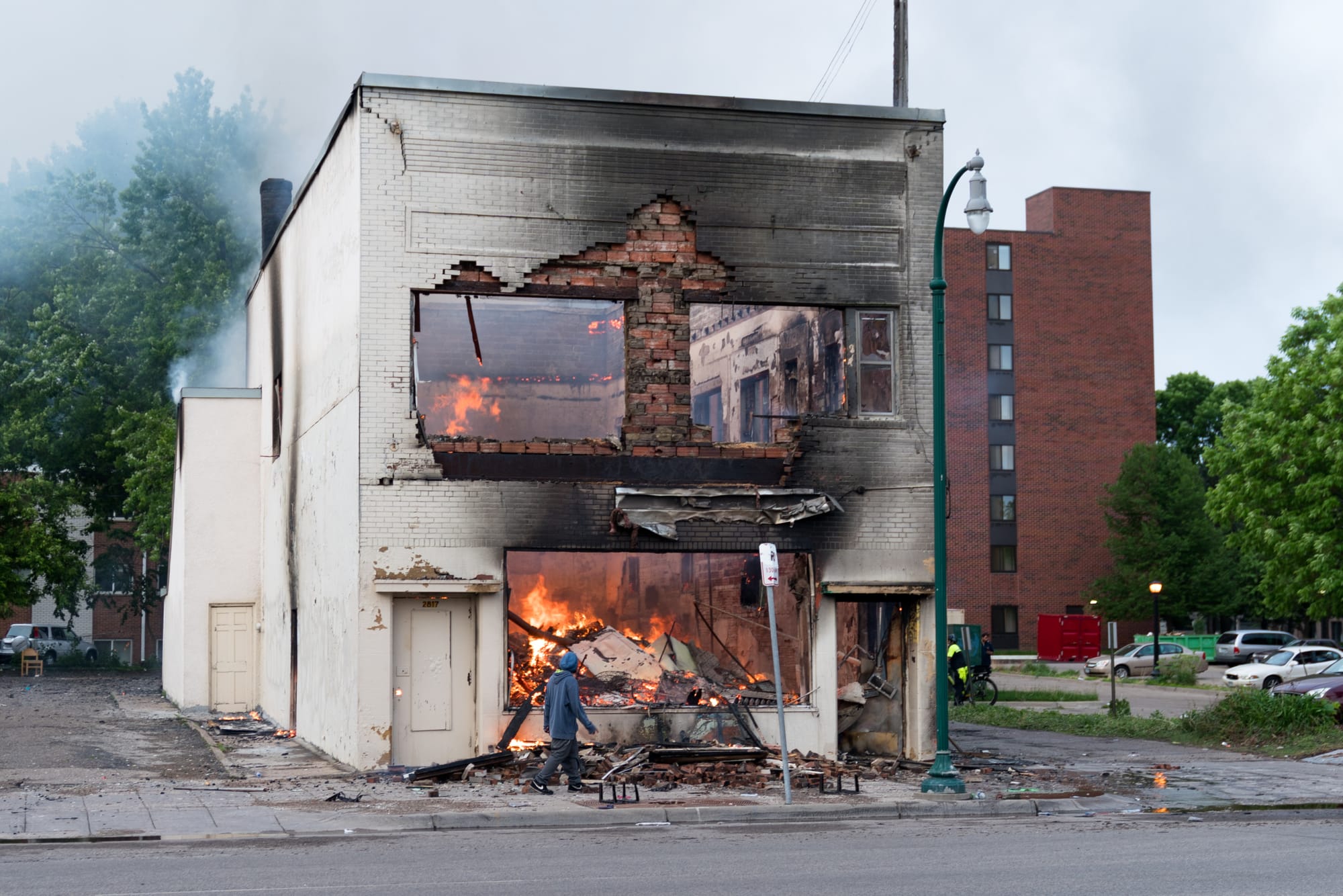 The multi-use building at 2815/2817 on East Lake Street in Minneapolis, Minnesota, United States was entirely destroyed by arson on May 28, 2020. The damage occurred during civil unrest following the May 25 murder of George Floyd. A cellphone store on the main level and eight apartment units were destroyed. Please attribute to Lorie Shaull if used elsewhere.