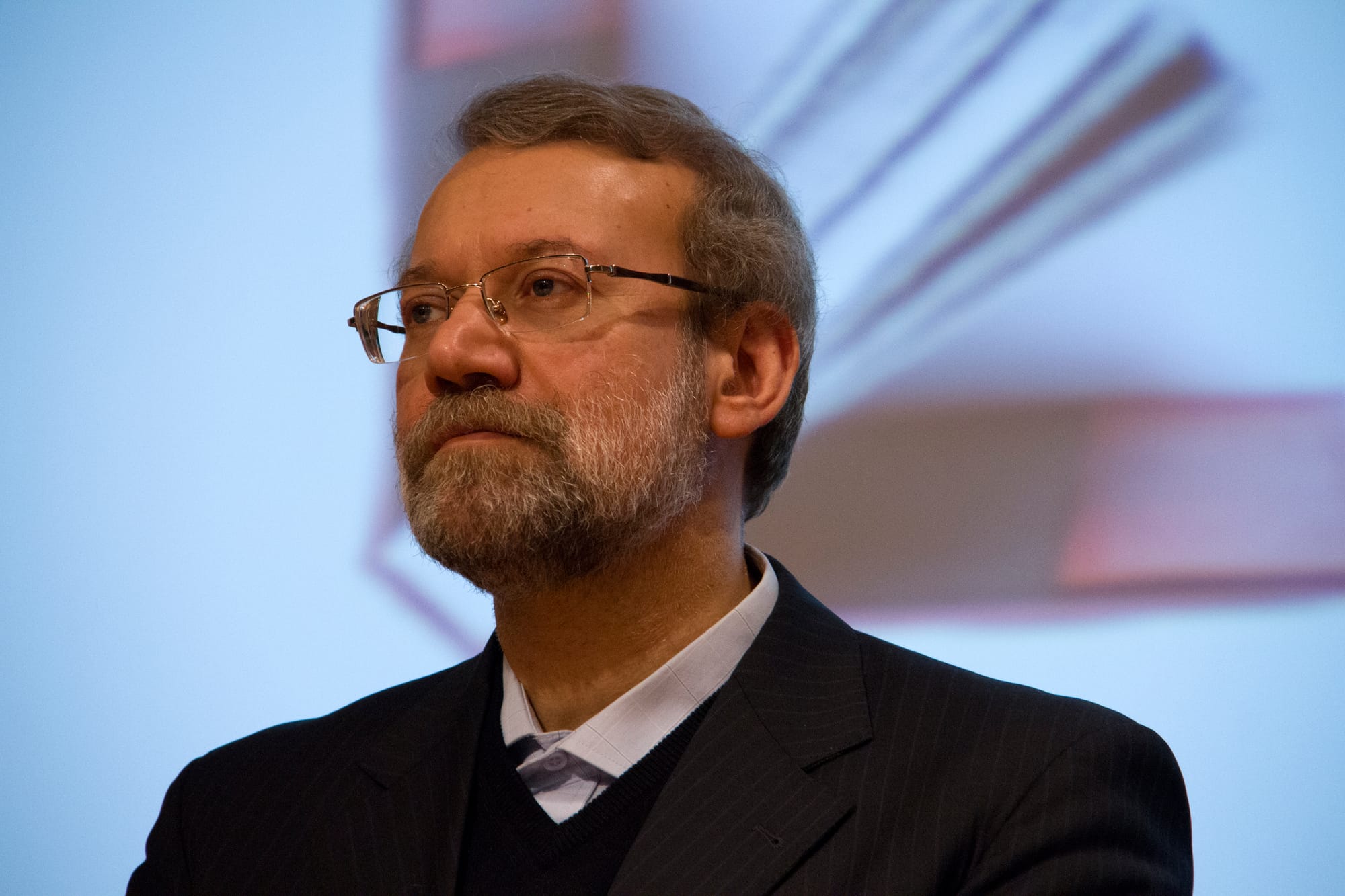 Ali Larijani is an Iranian philosopher, conservative politician and the current chairman of the Parliament of Iran. Larijani was the Secretary of the Supreme National Security Council from 15 August 2005 to 20 October 2007, appointed to the position by President Mahmoud Ahmadinejad, replacing Hassan Rouhani. Acceptance of Larijani's resignation from the secretary position was announced on 20 October 2007 by Gholamhossein Elham, the Iranian government's spokesman, mentioning that his previous resignations were turned down by President Ahmadinejad.