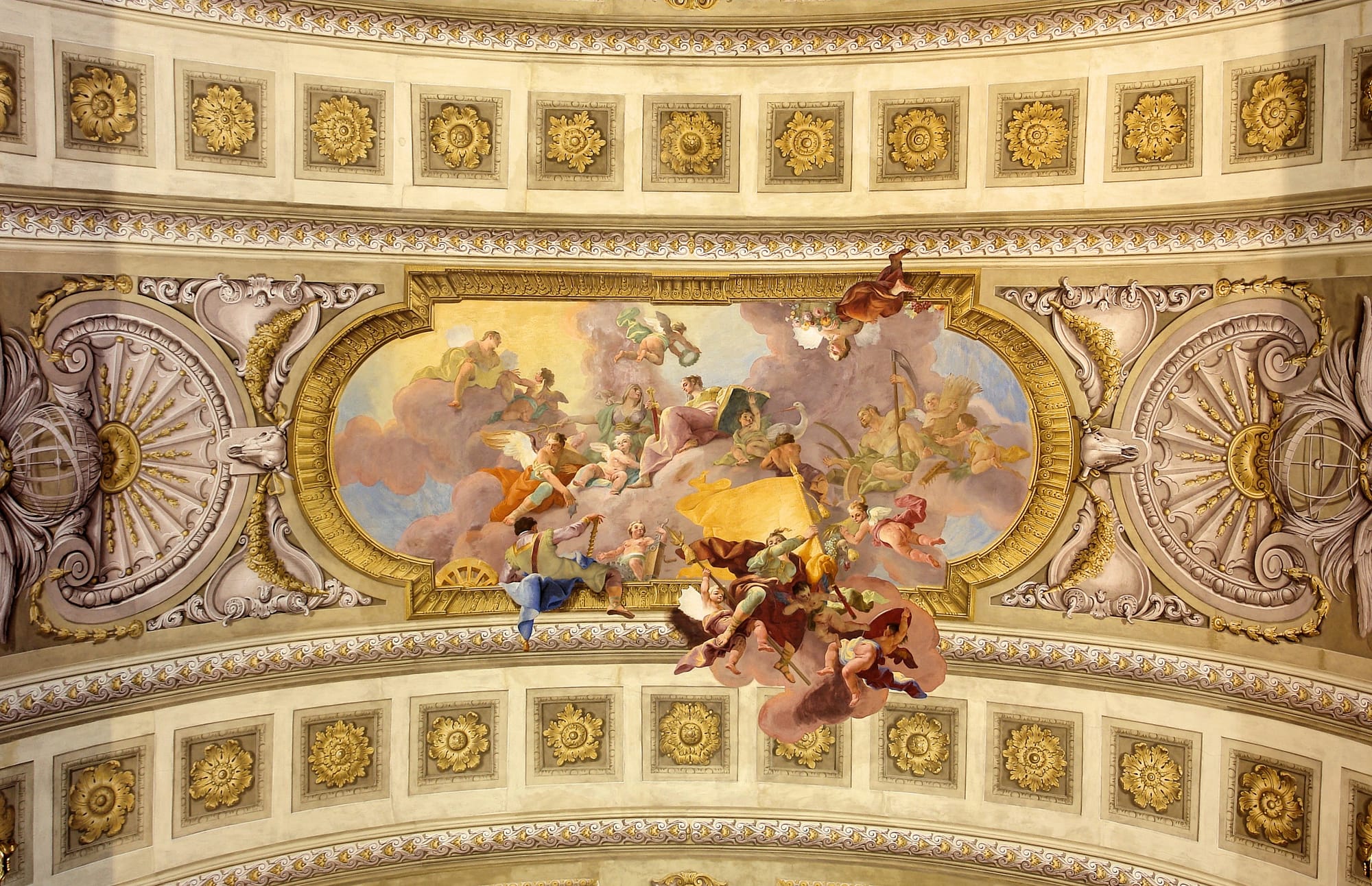 Prunksaal (splendor hall): allegory of war and law.
Ceiling painting made by Daniel Gran (1694–1757) and finished in 1730.
The splendor hall of the Austrian National Library [1] was designed and started by Johann Fischer von Erlach [2] and finished by his son Joseph Emanuel [3] in 1726.
The frescoes reflect the division of the Prunksaal, after the original list of the books, into a "war-law" and a "peace-heaven" wings.
The barock program for the fresco was done by Conrad Adolph von Albrecht (1682–1751)