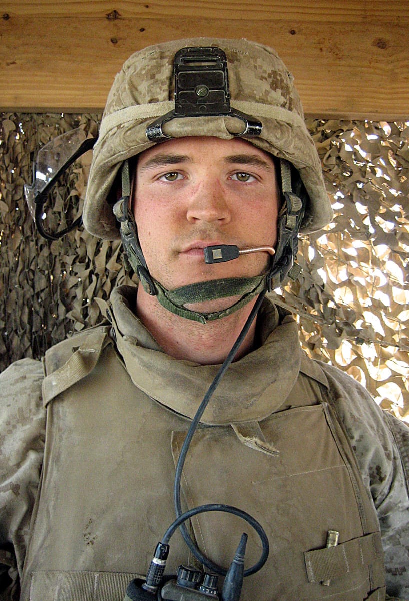 Lance Cpl. Lawrence F. Hiller, a 24-year-old from Austin, Texas, fired his M249 machine gun at a suicide bomber who attempted to ram his vehicle into one of the Marines' forward operating bases July 13, 2006.  All that remains of the incident is a burnt chassis. The car bomb was described by Lt. Col. Nicholas F. Marano, the battalion's commanding officer, as possibly the largest IED attack against Marines deployed near the border. One Marine, 24-year-old Lance Cpl. Lawrence F. Hiller of Austin, Texas, is credited to stopping the suicide bomber from breaching the Marines' outpost and causing further damage. Hiller's actions quite possibly saved lives, according to Marano. "Had Lance Cpl. Hiller not been alert at his post, this incident could have easily become catastrophic," said Marano. Since the battalion arrived here four months ago, the Marines have encountered mostly IED attacks, they say. Firefights between insurgents and Marines in this area have become rare since a large-scale offensive operation was launched in November 2005 to hamper the terrorists' control of the area. Back then, a previous Marine unit fought face-to-face daily with enemy forces during the four-week operation, which resulted in an estimated 150 insurgents killed or captured. (Photo by Cpl. Antonio Rosas)