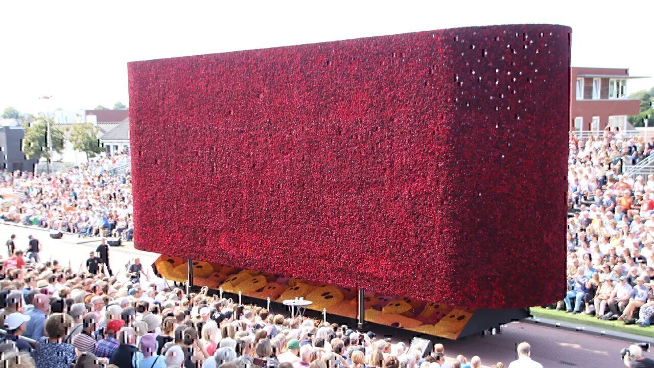 Float of the 2023 flower parade of Zundert from hamlet Molenstraat, titled "8.000.000.000". The float is seemingly something of a black box from the outside, but contains numerous figures inside, that can be seen peeking out from below on the mirrored surface.The float was 14th in the parade. With 558 points awarded, it won 5th place. It also won the "Pluim", a special award for floats with innovative design.The float was designed by Robin Schijfs, Gijs Martens, Ton van Beek and Jesse Verheijen.