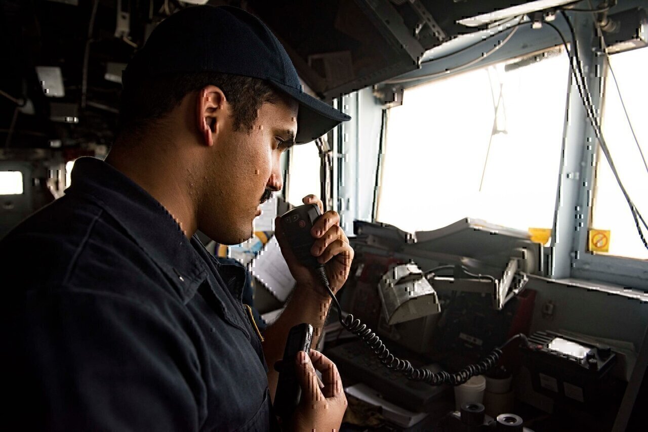 STRAIT OF HORMUZ (July 21, 2016) Lt j.g. Jonathan Bermudez, assigned to the guided-missile cruiser USS San Jacinto (CG 56), communicates with an Iranian warship during a transit of the Strait of Hormuz. San Jacinto, part of the Eisenhower Carrier Strike Group, is deployed in support of maritime security operations and theater security cooperation efforts in the U.S. 5th Fleet are of operations. (U.S. Navy photo by Mass Communication Specialist 3rd Class J. Alexander Delgado/Released) 160721-N-OR652-571 
Join the conversation:
www.navy.mil/viewGallery.asp
www.facebook.com/USNavy
www.twitter.com/USNavy
navylive.dodlive.mil
pinterest.com

plus.google.com