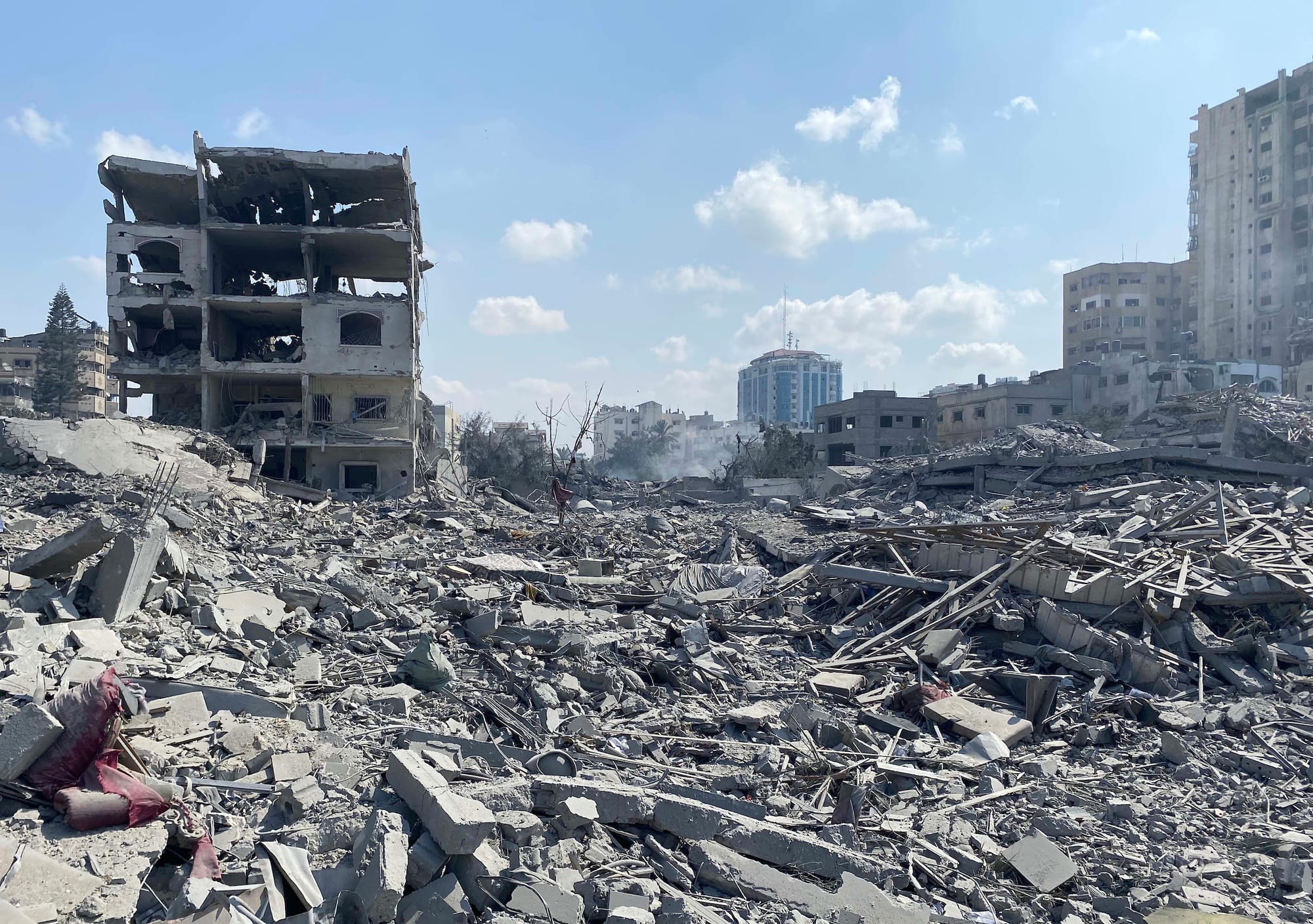 Damage following an Israeli airstrike on the El-Remal area in Gaza City on October 9, 2023. (Original caption stated that "Palestinians inspect the damage" but they are not visible in the photo, so the caption has been modified)