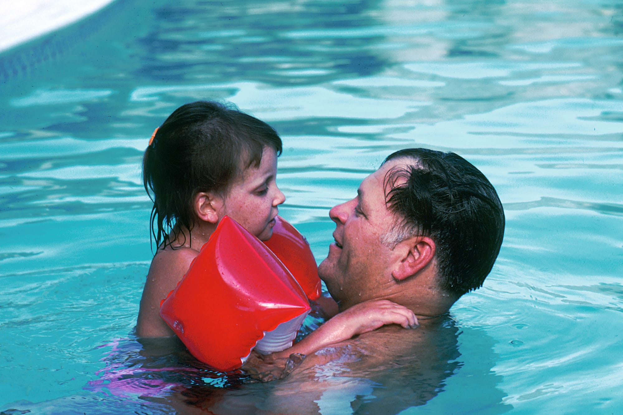 Title Father and Daughter in a Pool
Description A 10 year-old Caucasian girl with her father in a swimming pool. She was diagnosed at age three with a form of Acute Lymphoblastic Leukemia (ALL) that did not respond to therapy. She is presently in long-term remission after an experimental bone marrow transplant was performed. She now suffers from chronic GVH (Graft Versus Host Disease) which is rare.
Topics/Categories  People -- Adult People -- Child People -- Family/Friends People -- Recreation
Type Color, Photo
Source National Cancer Institute