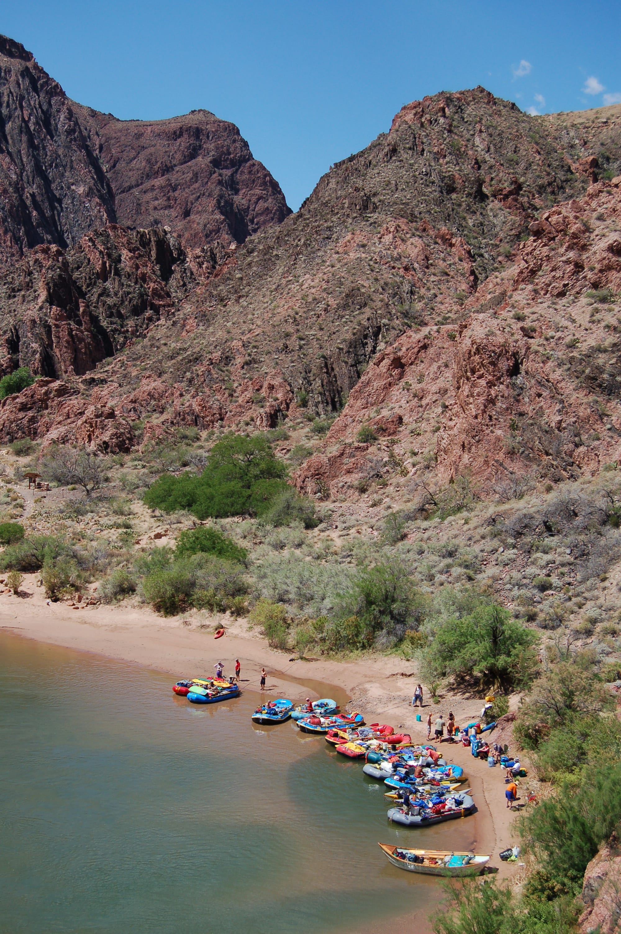 Boat Beach at Phantom Ranch (River Mile 88.1) as seen from the Black Bridge. River parties pull in here to obtain drinking water and to exchange passengers. Located 100 yards from boat beach, near the water spigots, weather and water flow bulletins are posted on a sheltered bulletin board. Phantom Ranch is a 1/2 mile (.81 km) walk up Bright Angel Creek. NPS Photo by Michael Quinn.
There are three different river trip opportunities through Grand Canyon National Park. Learn more: 
<a href="http://www.nps.gov/grca/planyourvisit/whitewater-rafting.htm" rel="nofollow">www.nps.gov/grca/planyourvisit/whitewater-rafting.htm</a>

While on river trips, we all seek something special for ourselves, our families, and our friends. This might be solitude or camaraderie, or both. Even though we are unique individuals, we visit the river and the canyon for many of the same reasons. By considering the needs of others and  leaving the canyon as pristine as or better than you found it, everyone has the potential to create a positive and safe river experience.