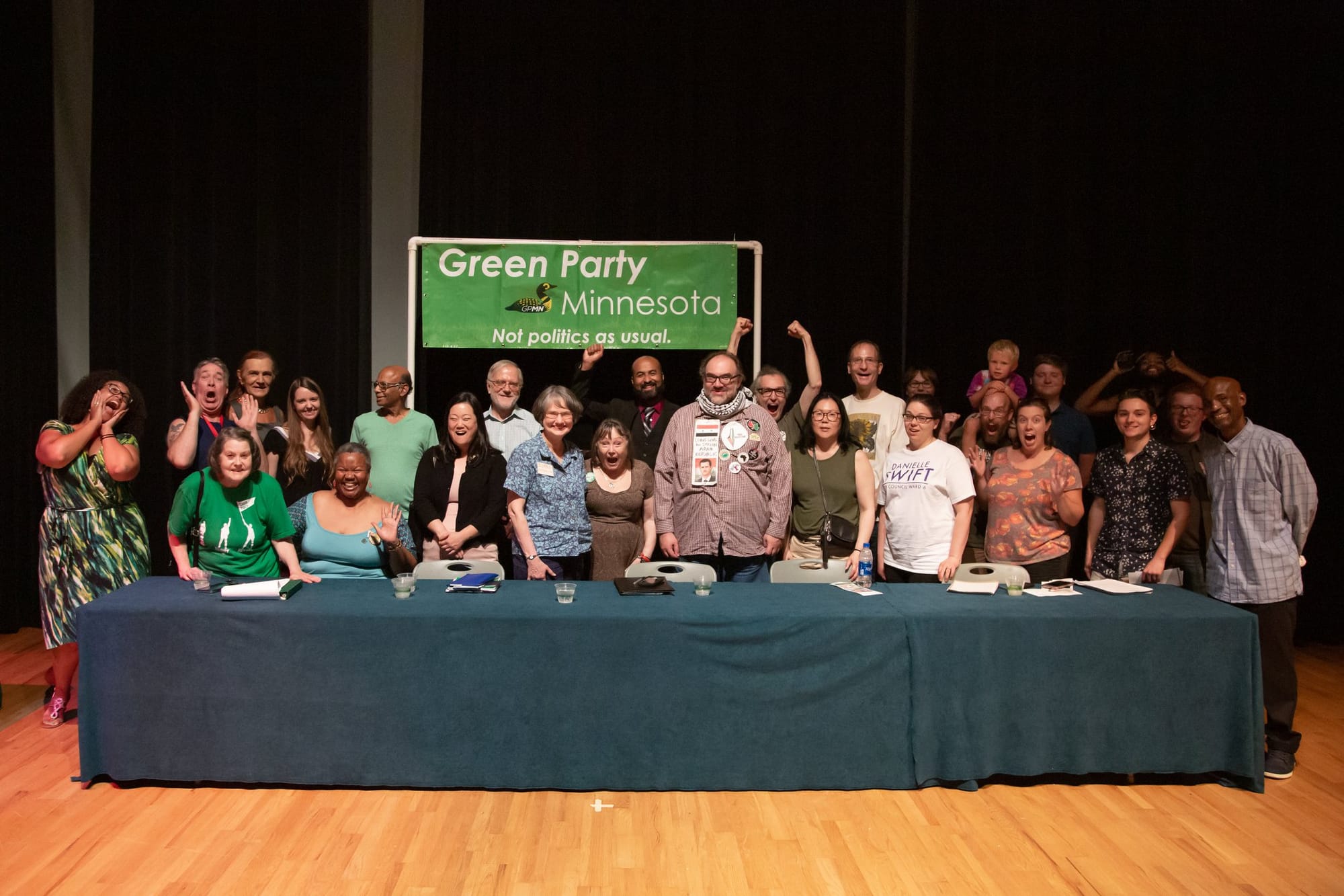 Image features supporters and presidential candidates of the Green Party United States