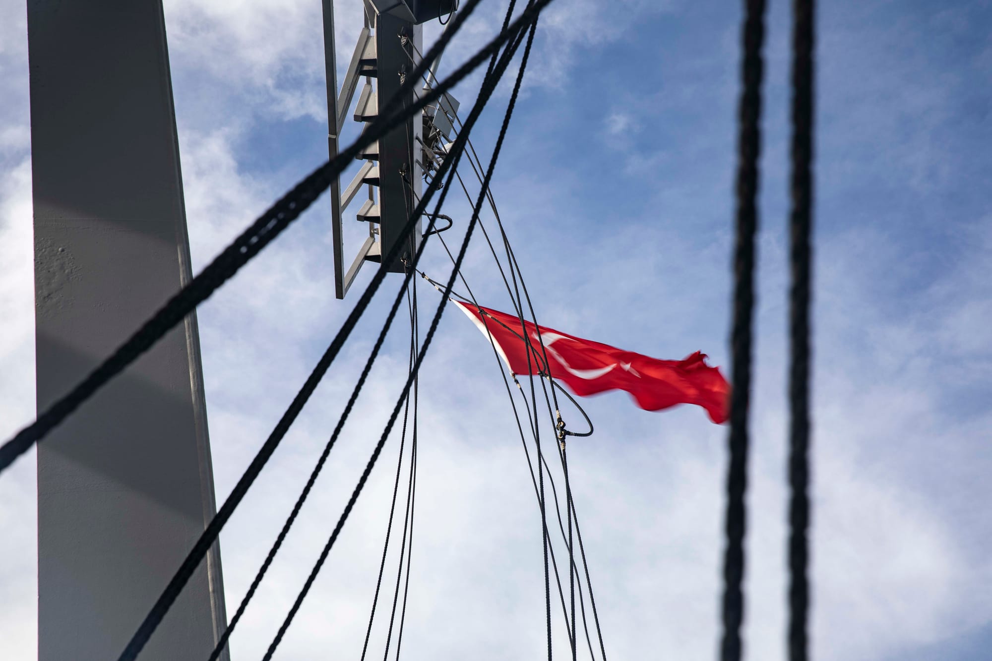 210210-N-BM428-0105 BLACK SEA (Feb. 10, 2021) The Turkish flag flies from the mast of the Arleigh Burke-class guided-missile destroyer USS Porter (DDG 78), as a sign of respect for our NATO Allies, while transiting from the Black Sea to the Mediterranean Sea, Feb. 10, 2021. Porter, forward deployed to Rota, Spain, is on its ninth patrol in the U.S. Sixth Fleet area of operations in support of U.S. national interests and security in Europe and Africa. (U.S. Navy photo by Mass Communication Specialist 2nd Class Damon Grosvenor)
