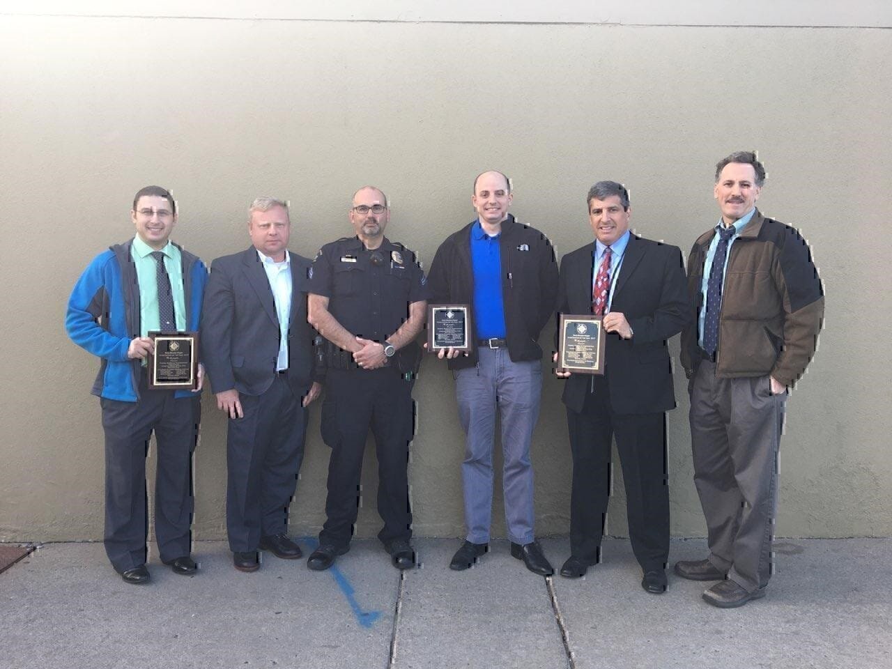 FBI Denver Special Agents Ryan English and Matt Dahl and Jefferson County Joint Terrorism Task Force Officer Chris Bryne were recently recipients of the International Association of Financial Crimes Investigators, Rocky Mountain Chapter, Investigation of the Year Award for 2017. They received the award for their work on the "We the People" sovereign citizen matter, which to date has resulted in five convictions and state sentences totaling 68 years. Four additional defendants in the matter still await trial.
Pictured are (L to R): Investigator Peter Muggli (Colorado Department of Revenue); Special Agent Matt Dahl; Officer Michael Ciavatta (formerly Colorado Attorney General's Office, now Golden Police Department); Special Agent Ryan English; Prosecutor Rob Shapiro (Colorado Attorney General's Office); and Task Force Officer Christian Byrne (Jefferson County Sheriff's Office).