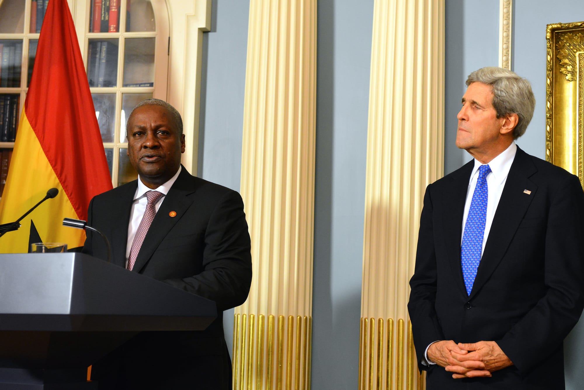 U.S. Secretary of State John Kerry listens as Ghana's President John Dramani Mahama delivers remarks at the Ghana Compact Signing Ceremony at the U.S. Department of State in Washington, D.C., on August 5, 2014. Leaders from across the African continent are in the nation's capital for a three-day U.S.-Africa Leaders Summit, the largest event any U.S. President has held with African heads of state and government.