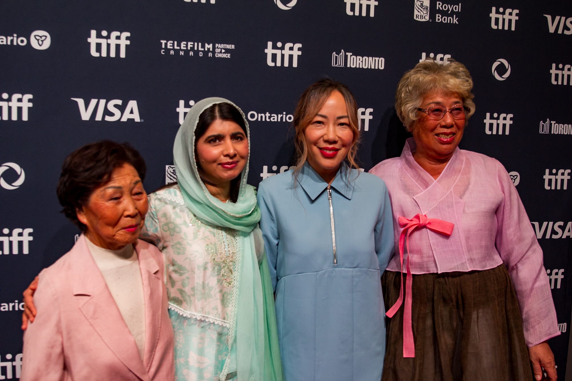 Lee Hee-Soon, Malala Yousafzai, Sue Kim, and Jang Soon-duk at the 2024 Toronto International Film Festival (TIFF) for the movie The Last of The Sea Women.