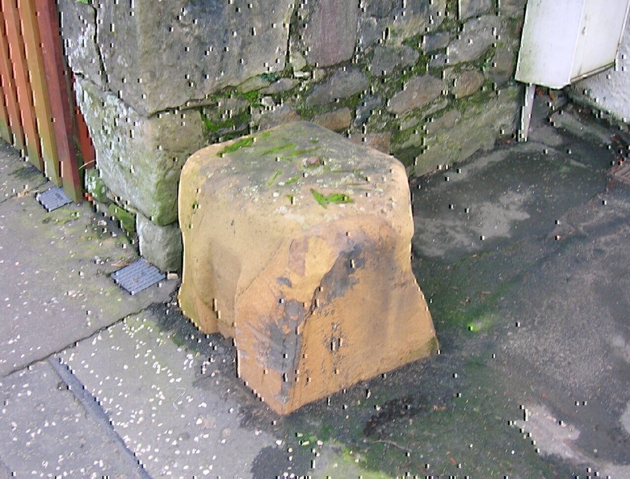 An old Cheese Press later used as a mounting block, Loans, South Ayrshire, Scotland.