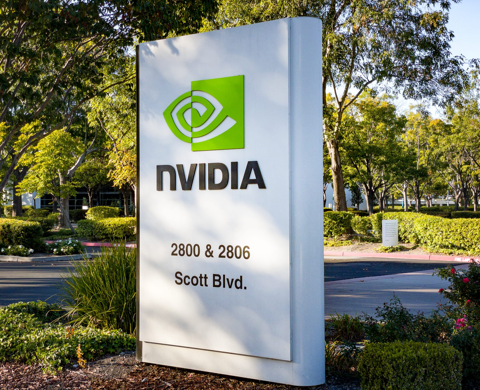 NVIDIA sign outside their headquarters office campus on Scott Boulevard in Santa Clara, California, located at 2800 & 2806 Scott Boulevard, Santa Clara, California 95050. NVIDIA is best known for making Graphical Processing Units, or GPUs, but also creates System-on-a-Chip, or SoCs, such as the NVIDIA Tegra, used in a variety of mobile applications. NVIDIA owns Arm Holdings, which designs ARM CPUs, and Mellanox Technologies, maker of next-generation networking devices.