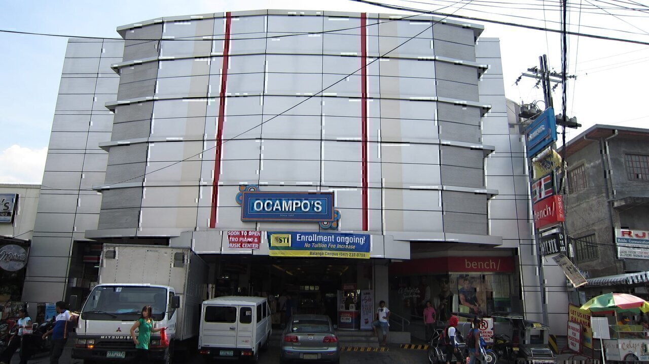 Santiago Lagman Ocampo, a traveling jewelry salesman, during the pre-war, established Ocampo’s. His empire has been in circulation for 6 decades and still counting, entrepreneurial activities brought about by his siblings and grandchildren made this possible. From opening up a pawnshop and a jewelry store in Guagua in the early 50’s, backed up by the appliance boom in the 60’s propelled the retail outlets to new heights spreading out his children to areas in Angeles, Tarlac, Manila, San Fernando, Pampanga, Olongapo, Baguio to name a few.
An enterprising daughter, Amada Ocampo Gutierrez, who was supported by a loving husband, Architect Victor M. Gutierrez, was the matriarch and prime mover of Ocampo’s Olongapo. Continuing in the family tradition together with their children, sprung a pawnshop, jewelry, restaurants, silverworks, appliance store, consequently expanding to the distribution of LPG, selling apparel, leasing properties, franchising Bench boutique and STI computer school. Tapping geographically new markets in Subic, Dinalupihan, and Balanga wherein it shifted to multi-department retail stores.
Ocampo’s sells quality products. From appliances which carry top brands such as SONY, JVC, PANASONIC, SHARP, SAMSUNG, LG ETC. to RTW including BENCH-Balanga, HAMMERHEAD, LEE U.S.A., JAG, BUNNY, PINK and BLUE SODA, CARTER, HANFORD, BRATT, PENSHOPPE-Balanga, dealer of Dream Satellite in Olongapo branch, manages STI-Balanga, and the list goes on. This company is also engage in selling house wares, Sony PlayStations, furniture, and so much more. To meet the customers’ demand in technology and telecommunication, this company is now an authorized NOKIA dealer, reseller of SONY ERICSON, and MOTOROLA accessories for 8TC Enterprise. The group also has properties on lease being handled by G.O. 4&4 Property Management Corporation.

Aside from the above-mentioned, they also opened up Marysville Home Care in the U.S; ISIP Center as venue for events, workshops, and functions in Makati; Holy Family Retreat House in Prado, Lubao; and Prado Farms.