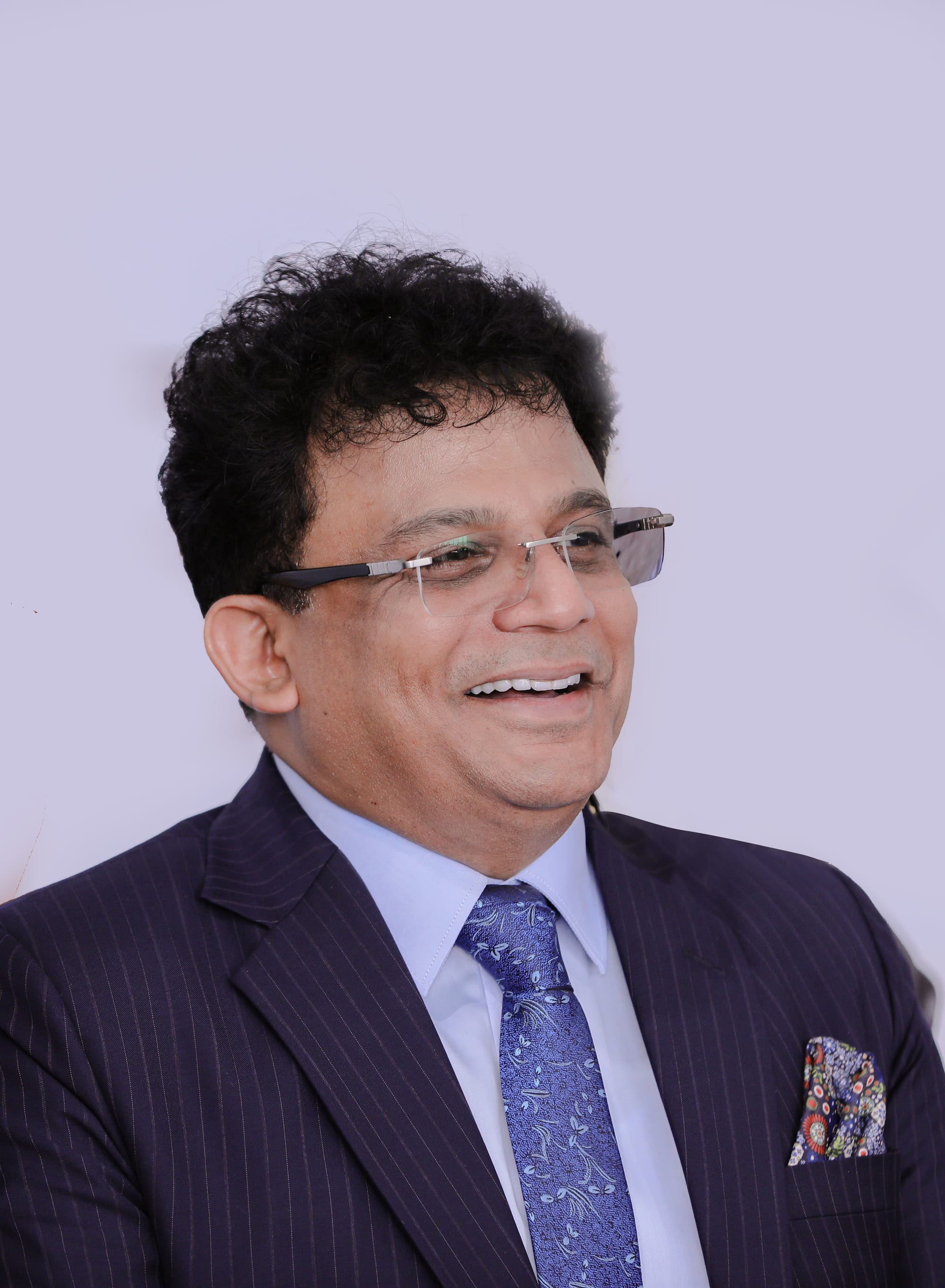 Birthday: 8th May, 1970
Nationality: Indian
Place of Birth: Mumbai, India
Occupation: Managing Director of Metal Care Center FZC, Hawk Steel Ltd, and CORACO GmbH
Educational achievements: • Schooling in Mumbai, India • Bachelor of Arts • Masters in Business Administration (Finance)
Parents: Sadashivan Pillai, Vijaya Sadashivan Pillai
Years Active: 1994-present
Spouse: Sandhya Shyam Pillai (m. 27th Dec 2001)
Website: http://www.metalcarecenter.com/
About:Shyam Pillai is a entrepreneur and businessman centered in Sharjah, UAE. He is the visionary and managing director of Metal Care Center FZC – a local enterprise with a wide-scale, global vision focused on activities ranging from international steel trading, steel service center and manufacturing.
As the ambitious director of MCC FZC, he leads worldwide hubs in Dubai, India and Europe, and has a thriving presence in over 15 countries.
Early Life: He was born in Mumbai, india into a humble upbringing. He did his schooling in Mumbai (1985). From the young age of 18, he has always had an eye for business, starting out his career with a local cable business. After finishing his bachelors degree, he came to Dubai where he furthered his career with a large multinational Japanese trading company. He was involved in many successful product launches and branding activities.
Career: With the aid of the rich experience and knowledge gained during his 16-year long association with the Japanese trading company, he founded Hawk Steel Ltd. in 2007 as a trading company and later founded Metal Care Center FZC (MCC) initially as a general trading company, steel service center and stockist and later a manufacturing company, focused on the local market in the UAE. Over years of perseverance and hard-work, the group grew rapidly to become a global trading and supply-chain specialist in steel and commodities.
Business: He is the director and shareholder of:
• Metal Care Center FZC, Sharjah – UAE (50% shareholder):In 2006, he founded the company from scratch in partnership with Patrick D’souza. As of January 2020, the company has commissioned a rolling mill to for the production of rebars and merchant bars with a capacity of 30K MT.
• Hawk Steel Ltd., Dubai – UAE (50% shareholder): Established in 2007, Hawk Steel is into trading within the GCC region and India. The turnover as of 31 March 2020 was about AED 70 million.

• CORACO GmbH, Germany (30% shareholder & Managing Director): Coraco GmbH is registered in Germany with a paid up capital of €3 million specializing in international trade with trade activities ranging across 15 countries covering SE Asia, India, Middle East, Africa & Europe including the UK. The annual turnover is about €500 million, selling about 1.4 million MT per annum.