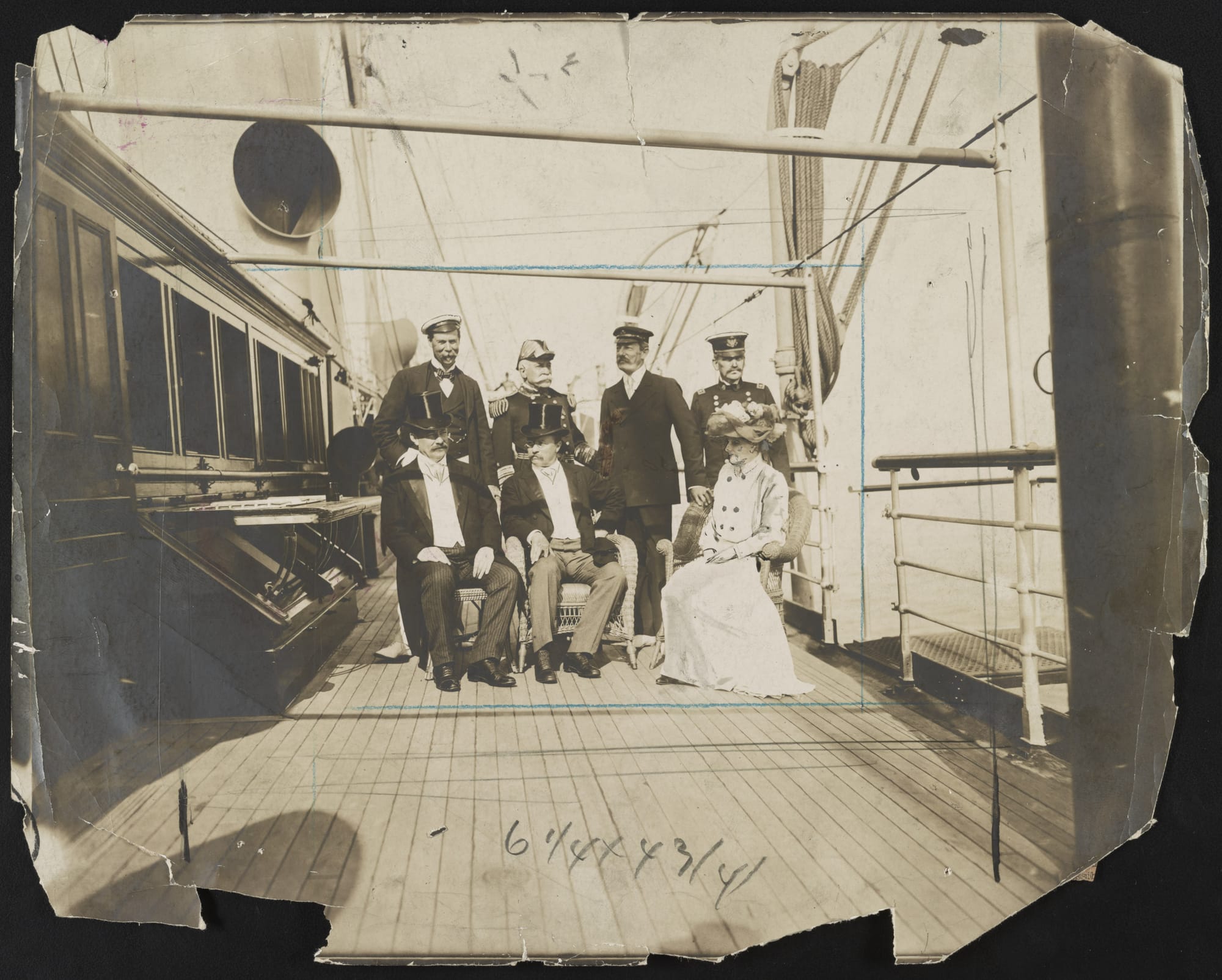 Title: President Roosevelt and his guests on board the Mayflower.
Photograph showing President Theodore Roosevelt, seated center, Secretary of the Navy William H. Moody, left, Mrs. Roosevelt, right; standing Sir Thomas Lipton, Admiral George Dewey, C. Oliver Iselin, and General Adna R. Chaffee on the deck of the Mayflower off Oyster Bay, Long Island, New York.
Abstract/medium: 1 photographic print.