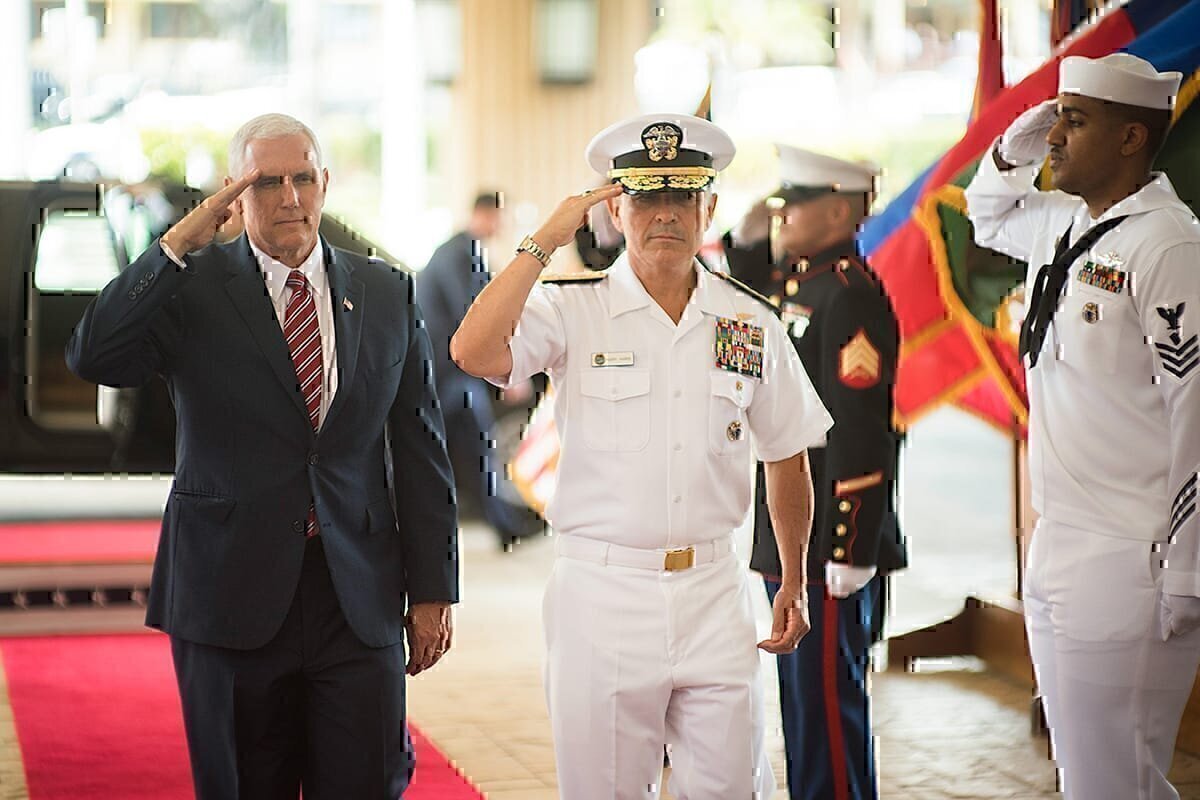 Vice President Mike Pence and Commander of U.S. Pacific Command, Adm. Harry B. Harris Jr., salute troops upon the Vice President’s arrival at Joint Base Pearl Harbor-Hickam in Hawaii, Monday April 24, 2017. (Official White House Photo by Myles Cullen)