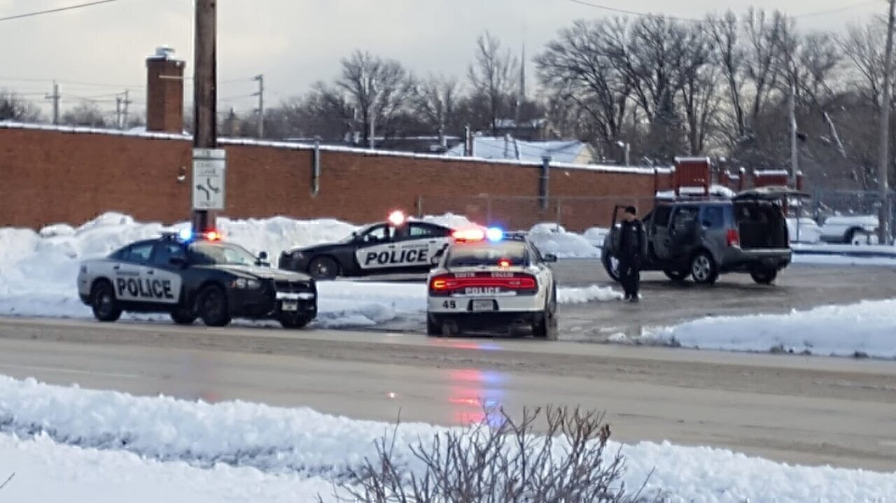 South Euclid Police engaged in the brief pursuit of a suspect in a black SUV on Mayfield Road. The suspect pulled into the parking lot of St. John Lutheran Church School, where he was arrested.
Source: https://flickr.com/photos/timevanson/27294124414/