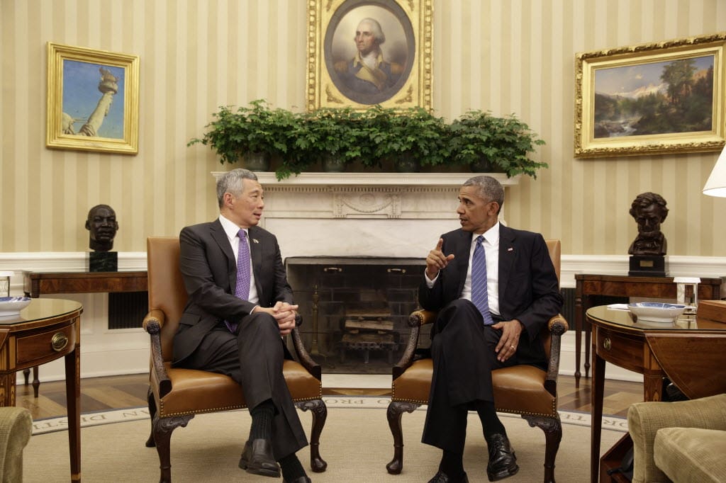 President Barack Obama and Prime Minister Lee Hsien Loong of Singapore talk before their bilateral meeting in the Oval Office, Aug. 2, 2016.
