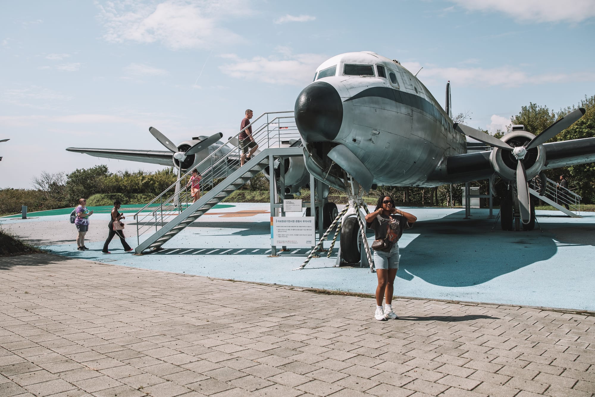 U.S. Army soldiers and families tour aircraft utilized during the Korean War at Jeju Island, South Korea, Sept 24-26, 2024. The Douglas C-54 Skymaster is a four-engined transport aircraft used by the United States Army Air Forces in the Korean War. The Republic of Korea provides cultural trips to U.S. Service Members and their families as a means to strengthen the ROK/US Alliance through cultural immersion. (U.S. Army photo by Spc. Kelsey Kollar)