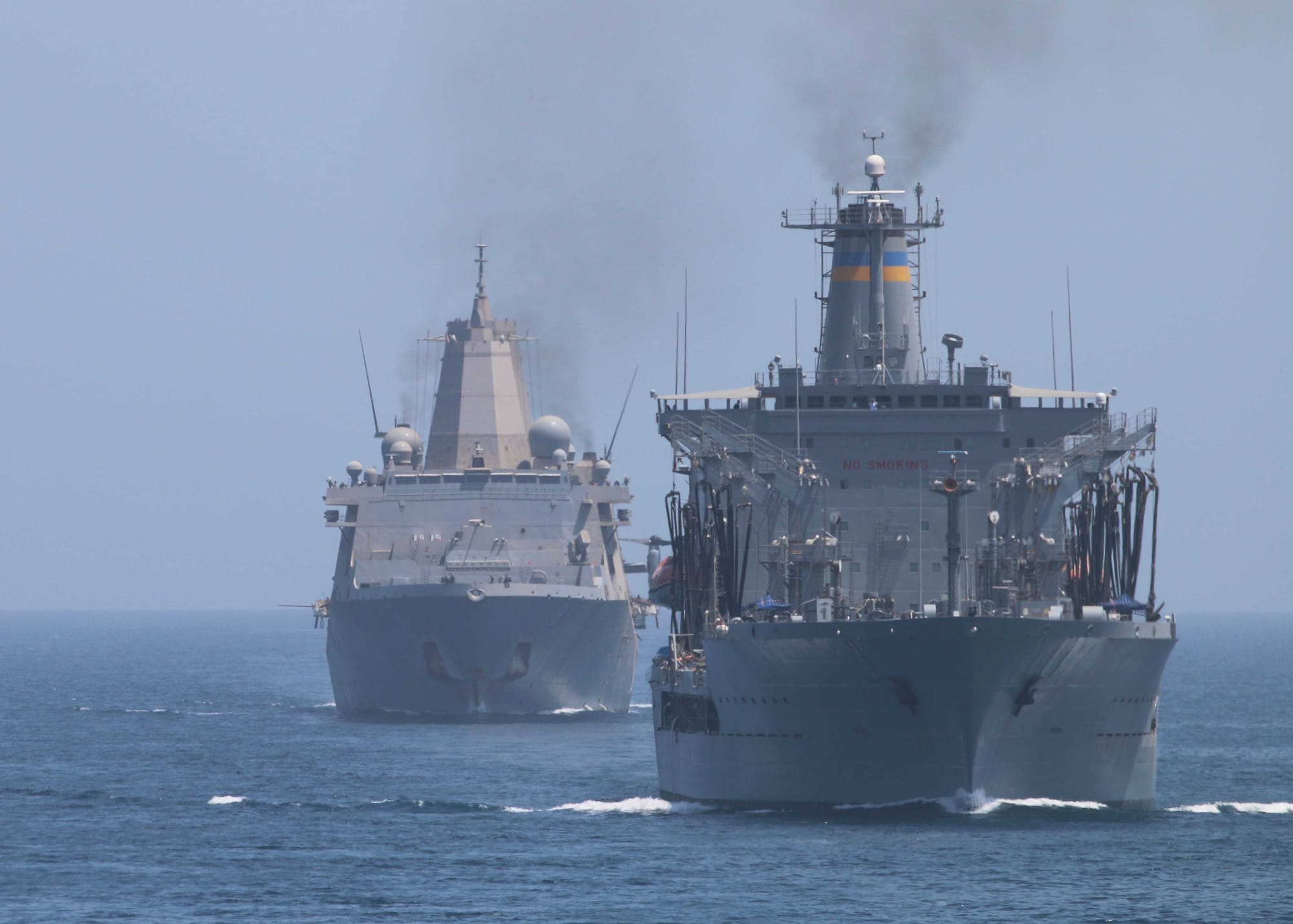 160626-N-GP524-530
STRAIT OF HORMUZ (June 26, 2016) The Military Sealift Command fleet replenishment oiler USNS John Ericsson (T-AO 194), right, and the San Antonio-class amphibious transport dock USS New Orleans (LPD 19) transit the Strait of Hormuz escorted by USS Stout (DDG 55). Stout, an Arleigh Burke class guided-missile destroyer deployed as part of the Eisenhower Carrier Strike Group, is supporting maritime security operations and theater security operations in the U.S. 5th Fleet area of operations. (U.S. Navy photo by Mass Communication Specialist 3rd Class Bill Dodge/Released)

Unit: Navy Media Content Services
DVIDS Tags: SAR; Search and Rescue; formation; ocean; transit; "Bahrain; RAS; GQ; general quarters; Arleigh Burke-class; USNS John Ericsson"; America; underway; CIWS; 6th Fleet; guided-missile destroyer; RIA; Manama"; forward deployed; Memorial Day; USS Stout (DDG 55); ship; SUEZ CANAL; Navy; COMREL; Sailor; community relations; destroyer; replenishment-at-sea; U.S. Navy; 5th Fleet; deployment; MC; USS New Orleans; Stout; USS Stout; DDG 55; Lt. Michael Murphy; NMCS; DVIDS Bulk Import; Mass Communication Specialist 3rd Class Bill Dodge; MC3 Bill Dodge; Murph Challenge; ARGONAUT 2016; Sailors giving back