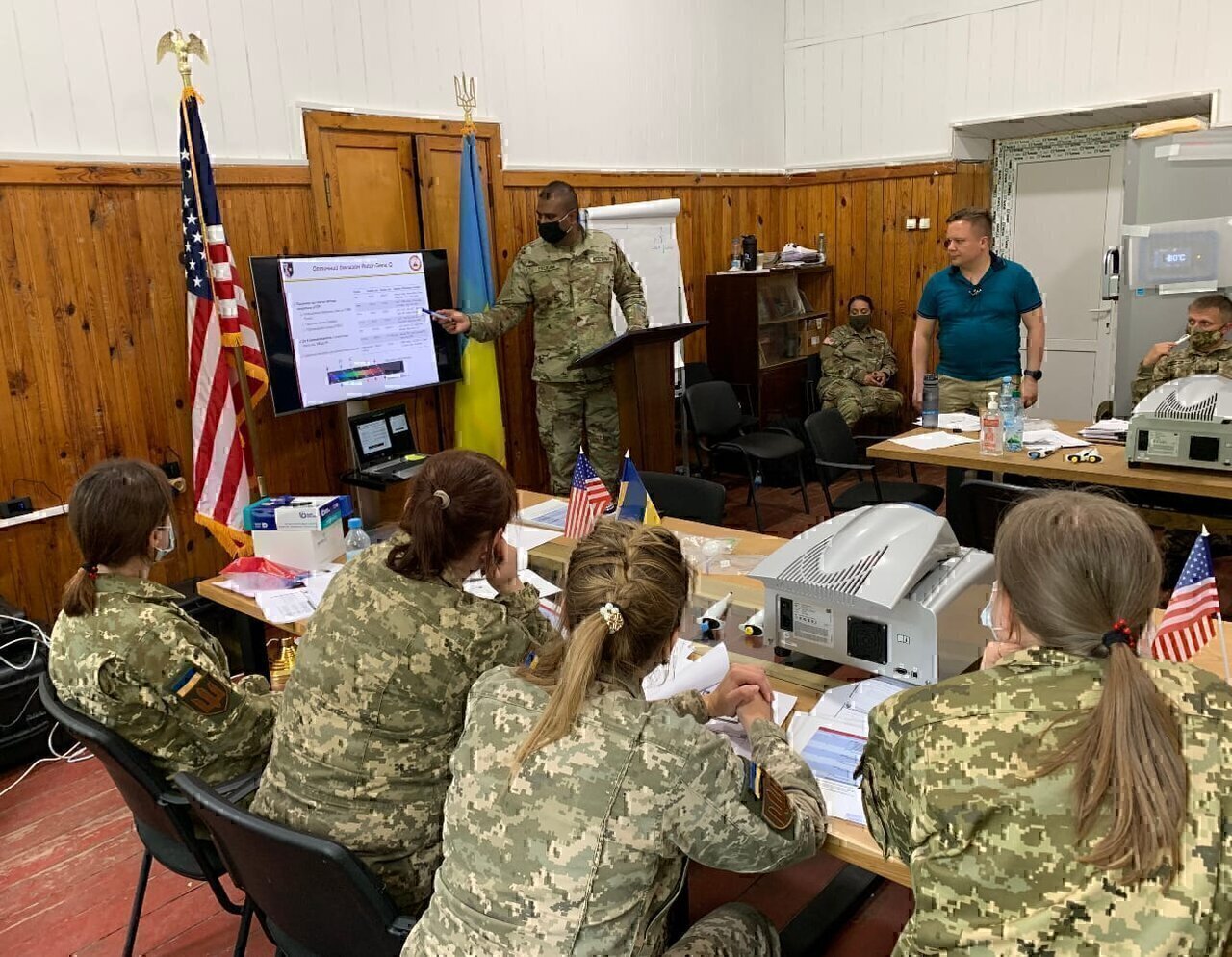 Maj. Mathanraj Packiam briefs Ukrainian troops in Kyiv, Ukraine, during a U.S. Defense Threat Reduction Agency training initiative in June 2021. Packiam passed the demanding American Board of Medical Microbiology exam. U.S. Army photo by Maj. Jang-woo Lee.