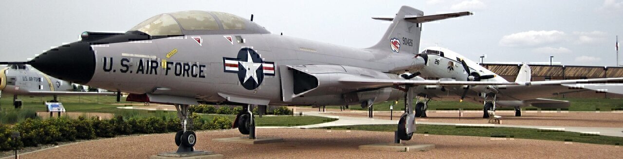 (South Dakota Air and Space Museum collection, Ellsworth Air Force Base, Rapid City, South Dakota, USA)
The F-101B Voodoo is a United States Air Force plane used in the 1950s to 1980s. It is a two-seat, twin-jet engine, interceptor-fighter plane.
From exhibit signage:
F-101B Voodoo
Top Speed - 1,100 miles per hour
Crew - 2
Range - Continental
Payload - 4 air-to-air missiles, or 2 missiles and 2 Genie nuclear rockets
Partners in the Cold War: the Royal Canadian Air Force
Jets like this one served as interceptors: they defended the nation's borders against aerial attack. But although they were designed for our Air Force, American aerospace companies also supplied our allies. F-101s (designated CF-101s) were the primary air defense for the Royal Canadian Air Force for over 20 years. In the Voodoo, Canadian pilots intercepted Soviet planes testing North American defenses.
See info. at:
<a href="https://en.wikipedia.org/wiki/McDonnell_F-101_Voodoo" rel="nofollow">en.wikipedia.org/wiki/McDonnell_F-101_Voodoo</a>
