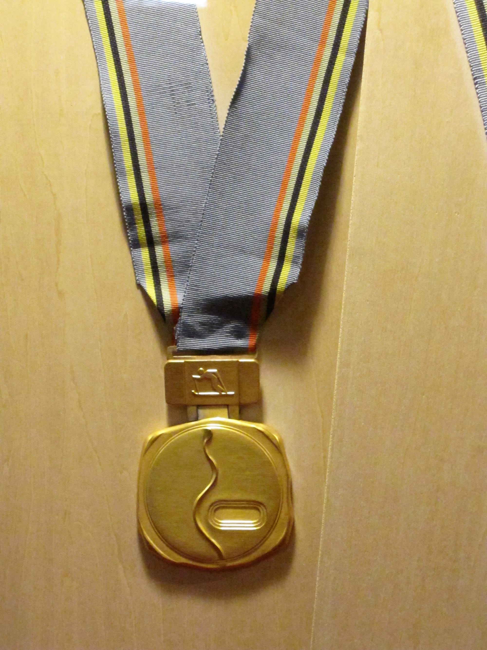 The front of 1972 Winter Olympics gold medal, displayed in Japan Mint Saitama Museum.