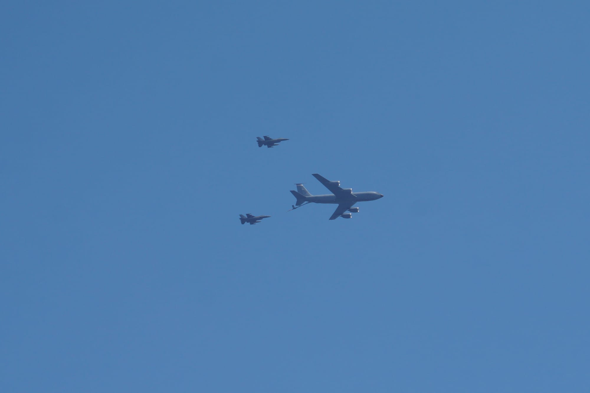 A Wisconsin Air National Guard Boeing KC-135 Stratotanker and General Dynamics F-16 Fighting Falcons at the 2022 Milwaukee Air and Water Show along Lake Michigan in Milwaukee, Wisconsin (United States).