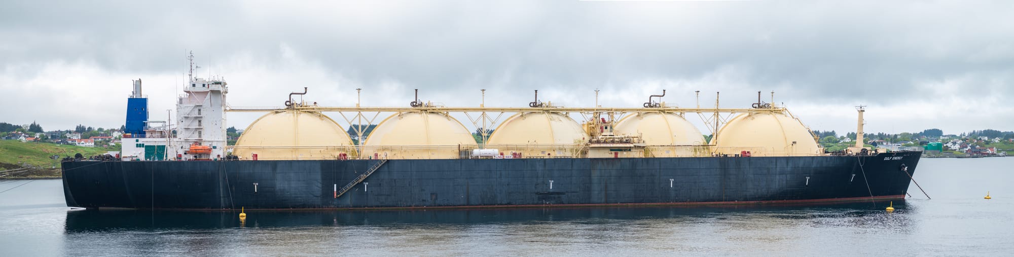 LNG tanker, GULF ENERGY - IMO 7390143, at anchor in the Karmsundet strait beside Bukkøy Island. Haugesund, Rogaland county, Norway. on May 20, 2023. While this tanker is being maintained, it has been anchored at this location for some time.