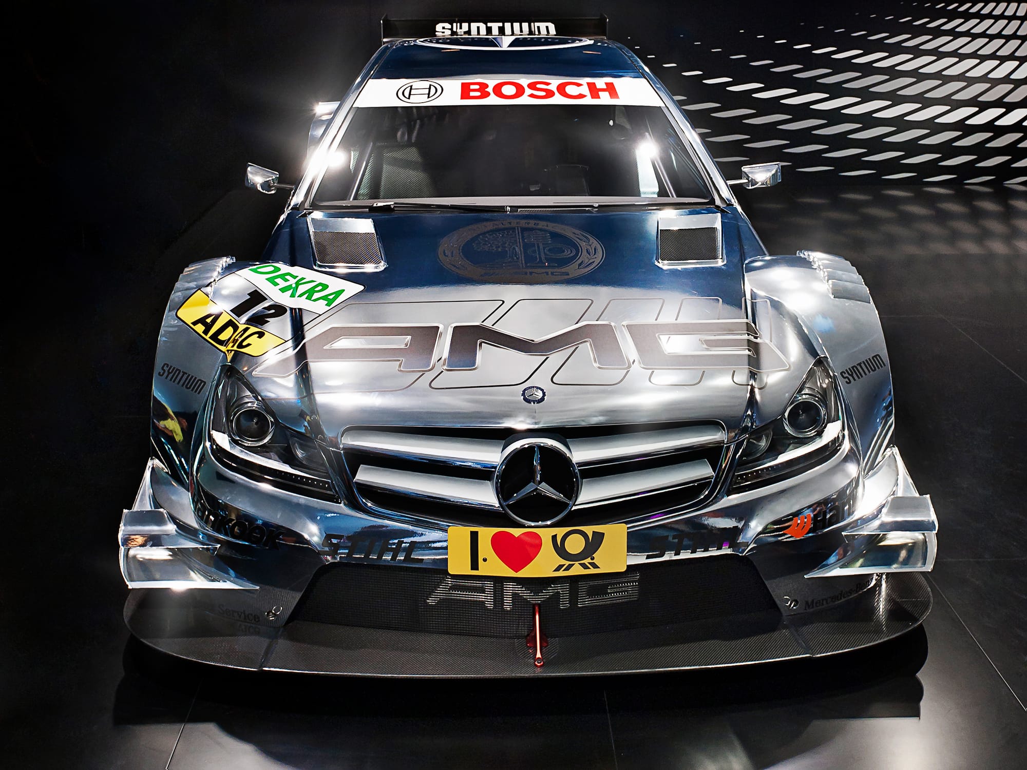 Front view of an AMG Mercedes-Benz C204, race car from the German Touring Car Championship (DTM) 2012. Photographed at the IAA 2011, Frankfurt, Germany.