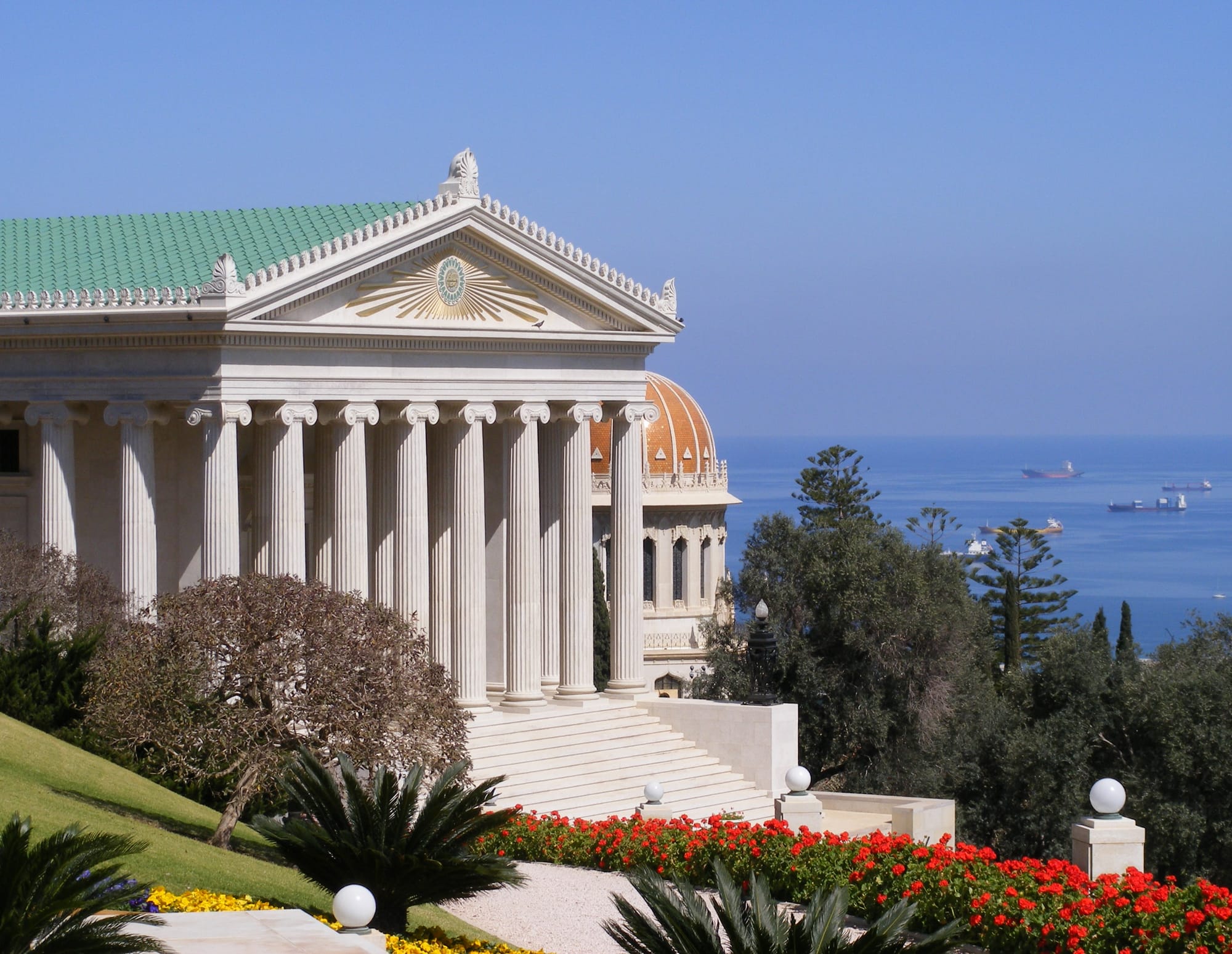 The International Bahá'í Archives building, overlooking the Shrine of the Báb and the Port of Haifa.