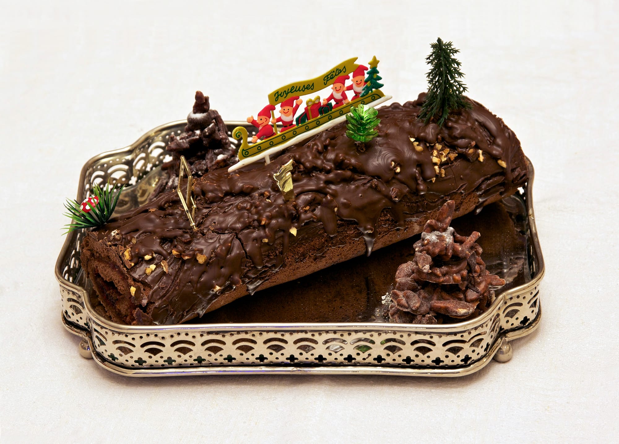 A home made "Bûche de Noël" (yule log), this one is chocolate filled with raspberry jam. French traditional dessert for Christmas.