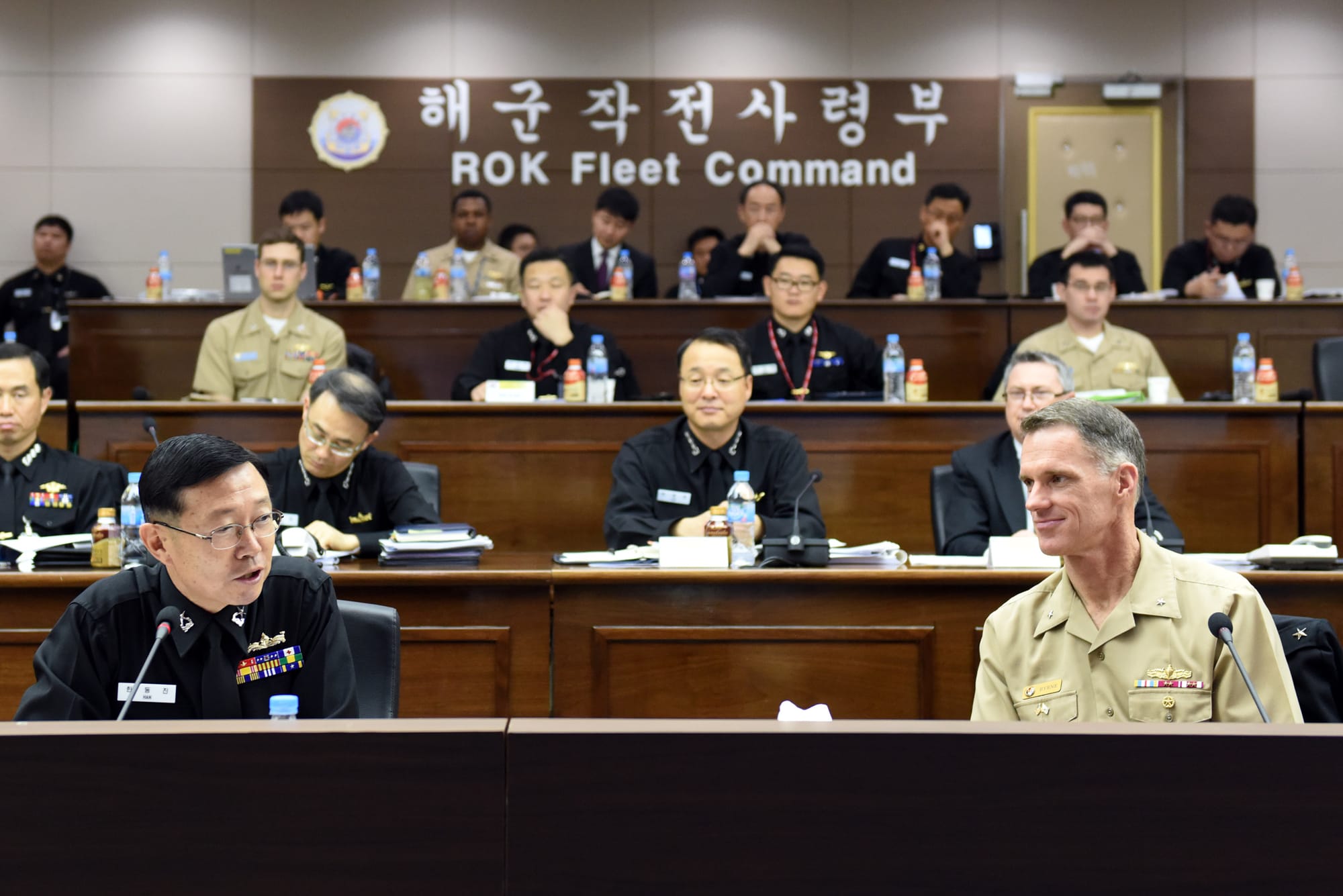 151201-N-AD372-113 
BUSAN, Republic of Korea, (Dec. 1, 2015) Rear Adm. Bill Byrne, commander of U.S. Naval Forces Korea, and Rear Adm. Han, Dong-Jin, chief of staff for Commander, Republic of Korea (ROK) Fleet, deliver opening remarks at the second U.S. and ROK Anti-Submarine Warfare (ASW), working group conference in Busan. The working group conference brought together senior naval leaders from both nations to discuss ASW operations, capabilities and strategic dialogue between the two maritime partners.