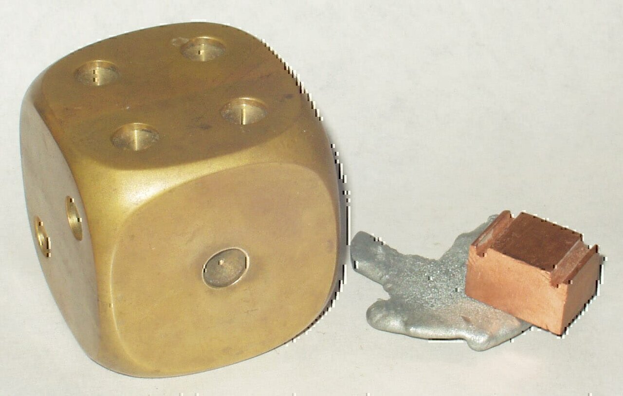 Solid brass (with a sample of the components: zinc and copper).