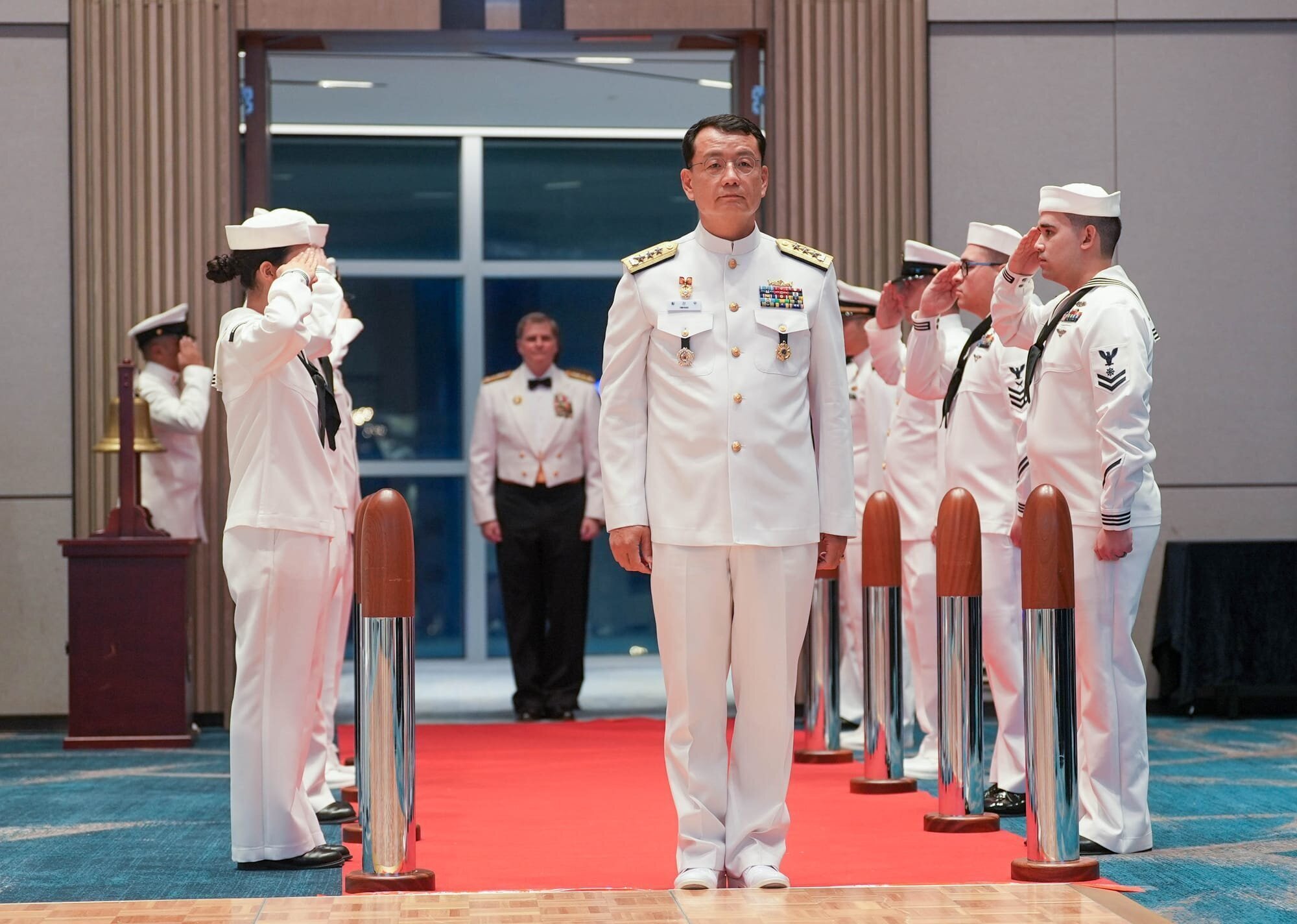 BUSAN, Republic of Korea (Sept. 26, 2025) – Republic of Korea Navy Vice Adm. Seonwoo Hwang, commander of Republic of Korea Fleet, arrives as part of the official party for Commander, U.S. Naval Forces Korea’s 250th U.S. Navy Birthday Ball, Sept. 26, 2025. Commander, U.S. Naval Forces Korea (CNFK) is the U.S. Navy’s representative in the Republic of Korea, providing leadership and expertise in naval matters to improve institutional and operational effectiveness between the two navies and to strengthen collective security efforts in Korea and the region. (U.S. Navy photo by Mass Communication Specialist Seaman Robert A. Moses)