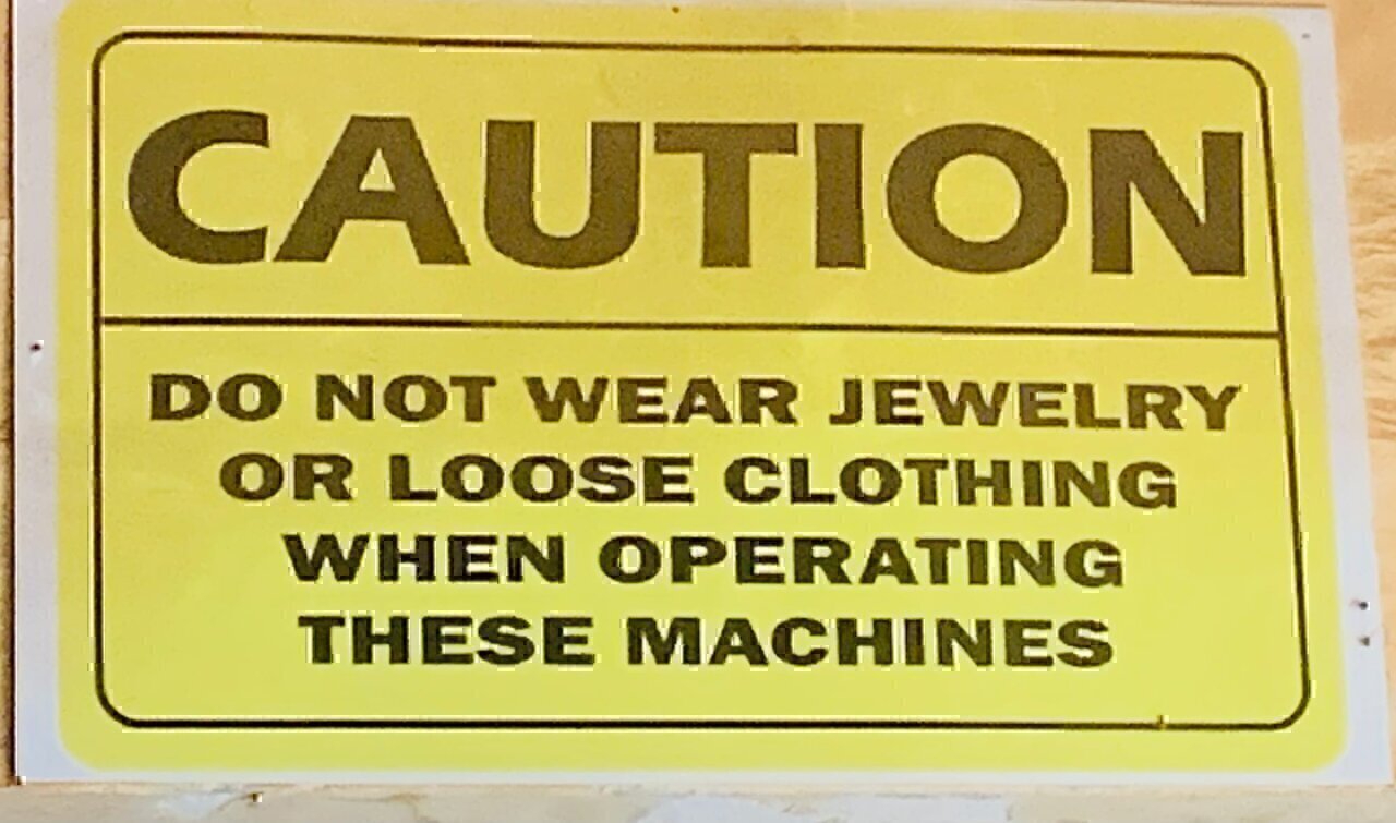 This is a safety level to prevent the wearying of in appropriate dress and jewellery pasted at the Wood Technology Department of Tamale Technical University
