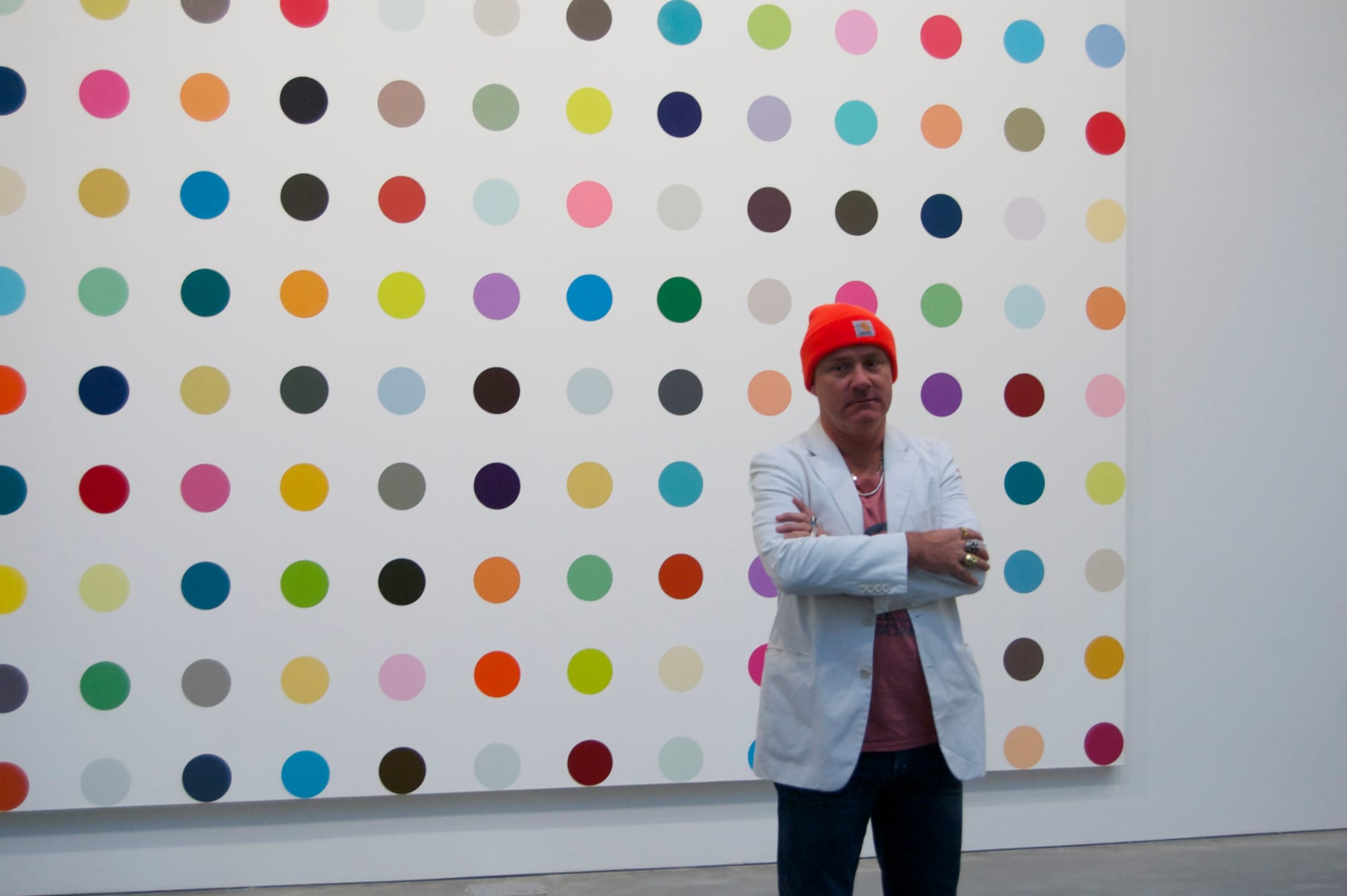 Damien Hirst at the exihibition Damien Hirst The Complete Spot Paintings 1986-2011, Gagosian Gallery, NYC.
