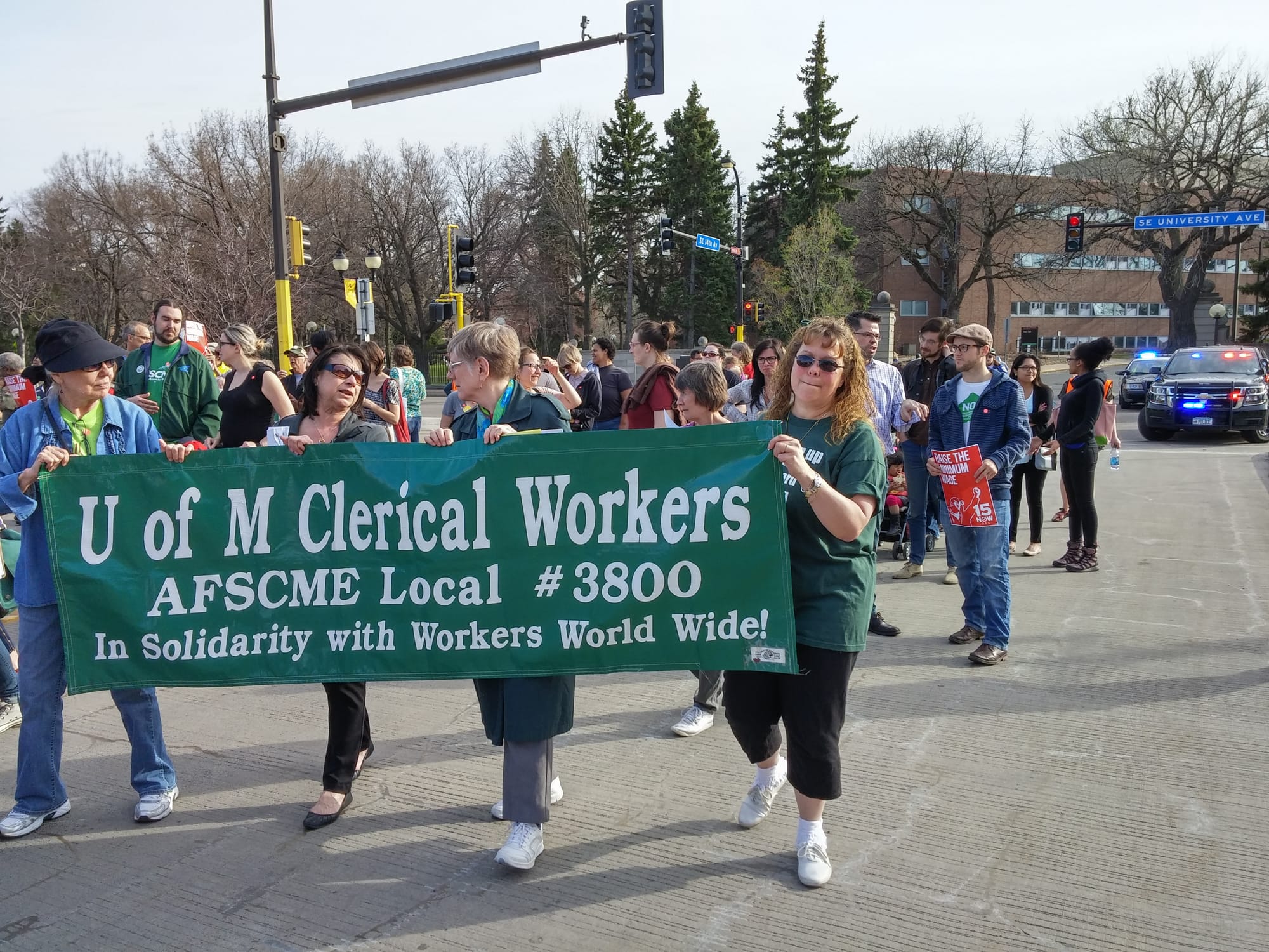 Dinkytown minimum wage march
Minneapolis, Minnesota, USA
April 15, 2015
Food workers across the USA walked out on strike to hold protests and marches demanding a $15/hour minimum wage. In the Twin Cities, striking fast food workers were joined by university workers, students, janitors, retail workers, and airport workers. They call for a $15/hour minimum wage, paid sick days, and fairer scheduling of work hours.
Protesters met at the University of Minnesota campus in Minneapolis and marched to the McDonalds restaurant in nearby Dinkytown.
Photo by Fibonacci Blue