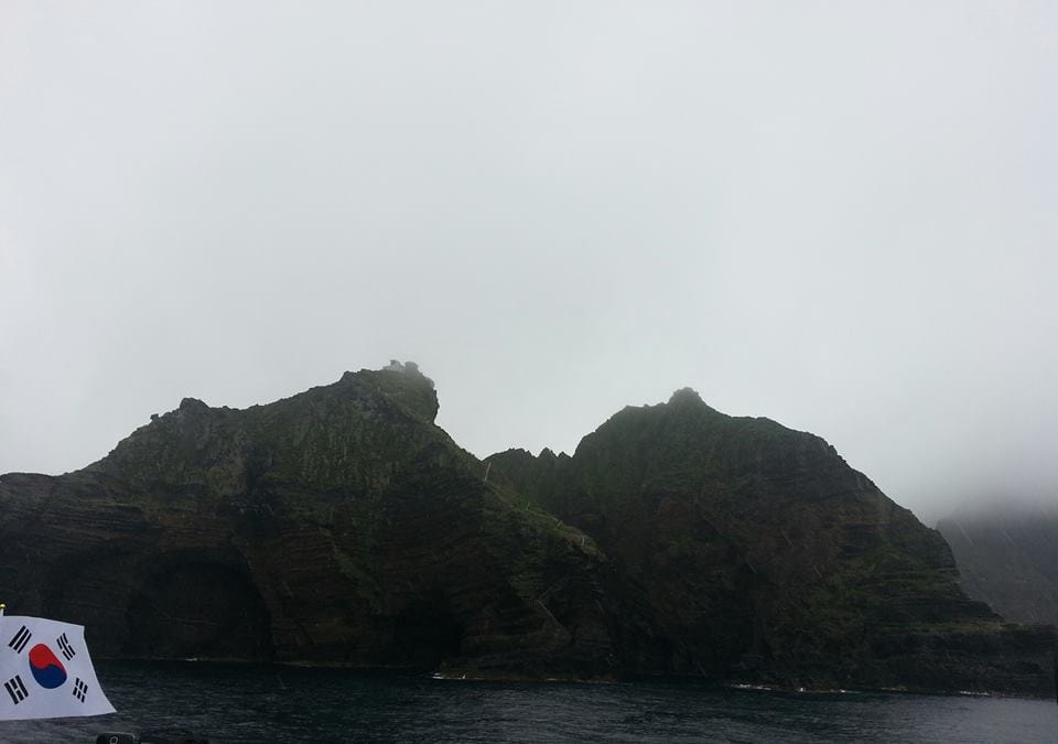 A view of the larger Dokdo Island on a passing boat.
