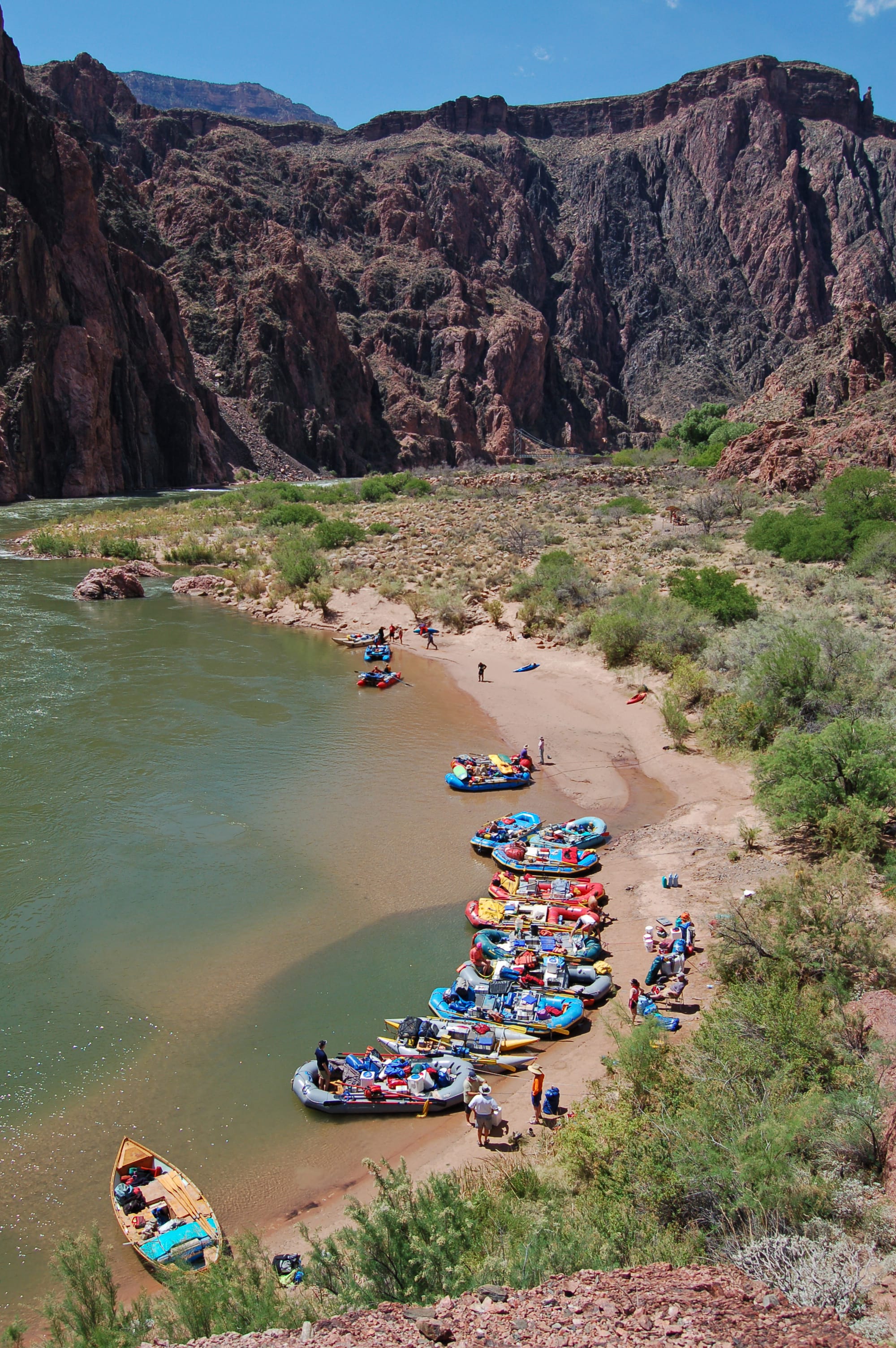 Boat Beach at Phantom Ranch (River Mile 88.1) as seen from the Kaibab Trail, just west of the Black Bridge. River parties pull in here to obtain drinking water and to exchange passengers. Located 100 yards from boat beach, near the water spigots, weather and water flow bulletins are posted on a sheltered bulletin board. Phantom Ranch is a 1/2 mile (.81 km) walk up Bright Angel Creek. NPS Photo by Michael Quinn.
There are three different river trip opportunities through Grand Canyon National Park. Learn more: 
<a href="http://www.nps.gov/grca/planyourvisit/whitewater-rafting.htm" rel="nofollow">www.nps.gov/grca/planyourvisit/whitewater-rafting.htm</a>

While on river trips, we all seek something special for ourselves, our families, and our friends. This might be solitude or camaraderie, or both. Even though we are unique individuals, we visit the river and the canyon for many of the same reasons. By considering the needs of others and by leaving the canyon as pristine as or better than you found it, everyone has the potential to create a positive and safe river experience.