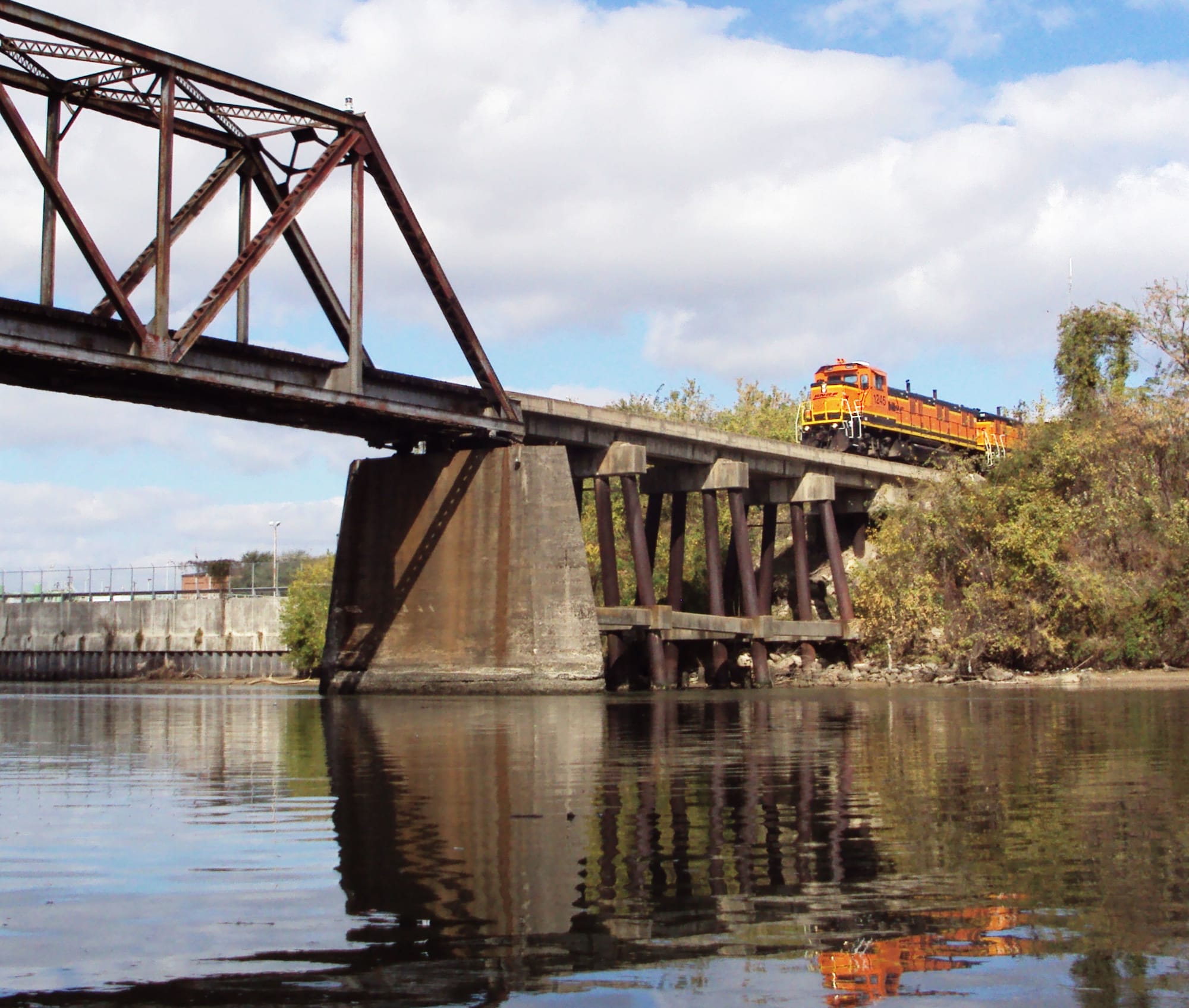 Kayaking upstream from downtown Houston gets most of the attention, but there is so much to see downstream from Allen's Landing.
There's the McKee Street Bridge that Kirk Farris painted at James Butte Park, Frost Town.  There's an old truss railroad bridge, now a bike and hike path.  There's an old drawbridge designed by the same fellow who would later design San Francisco's Golden Gate Bridge.  There are two swing railroad bridges, still able to swing if necessary.  There are occasional barges and tugs, and numerous places where they once tied up, and a few where they still do.

This trip we saw brown pelicans, cormorants, egrets, herons, and more.  Last time we even saw an osprey.