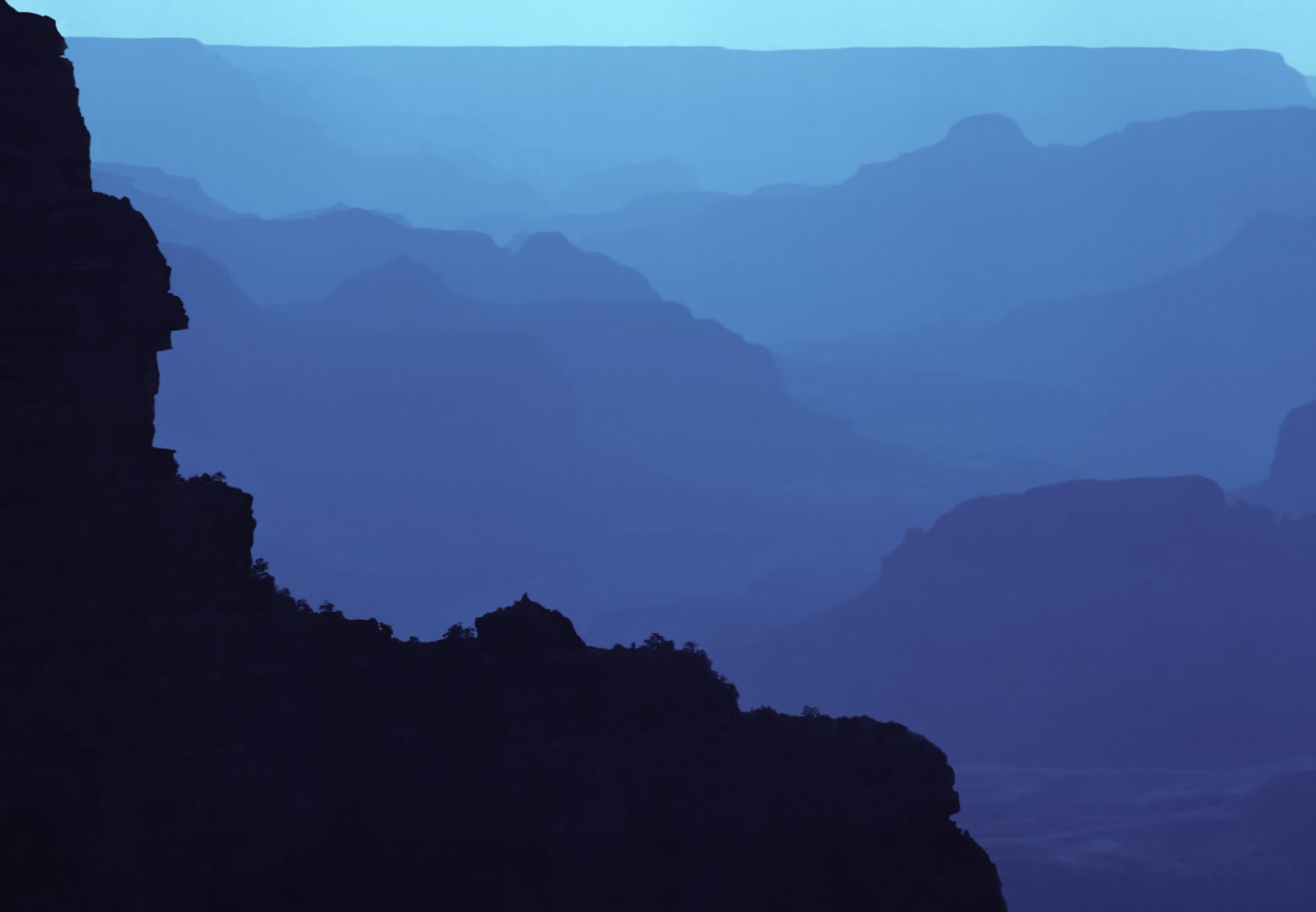 Hazy blue hour in Grand Canyon. View from the South Rim.
