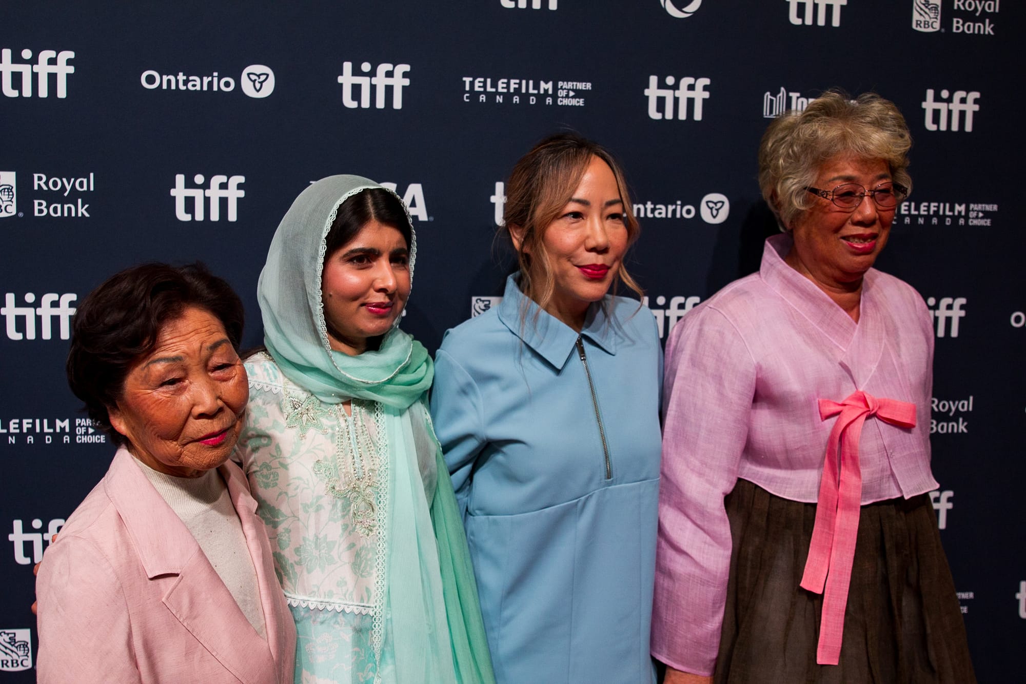 Lee Hee-Soon, Malala Yousafzai, Sue Kim, and Jang Soon-duk at the 2024 Toronto International Film Festival (TIFF) for the movie The Last of The Sea Women.