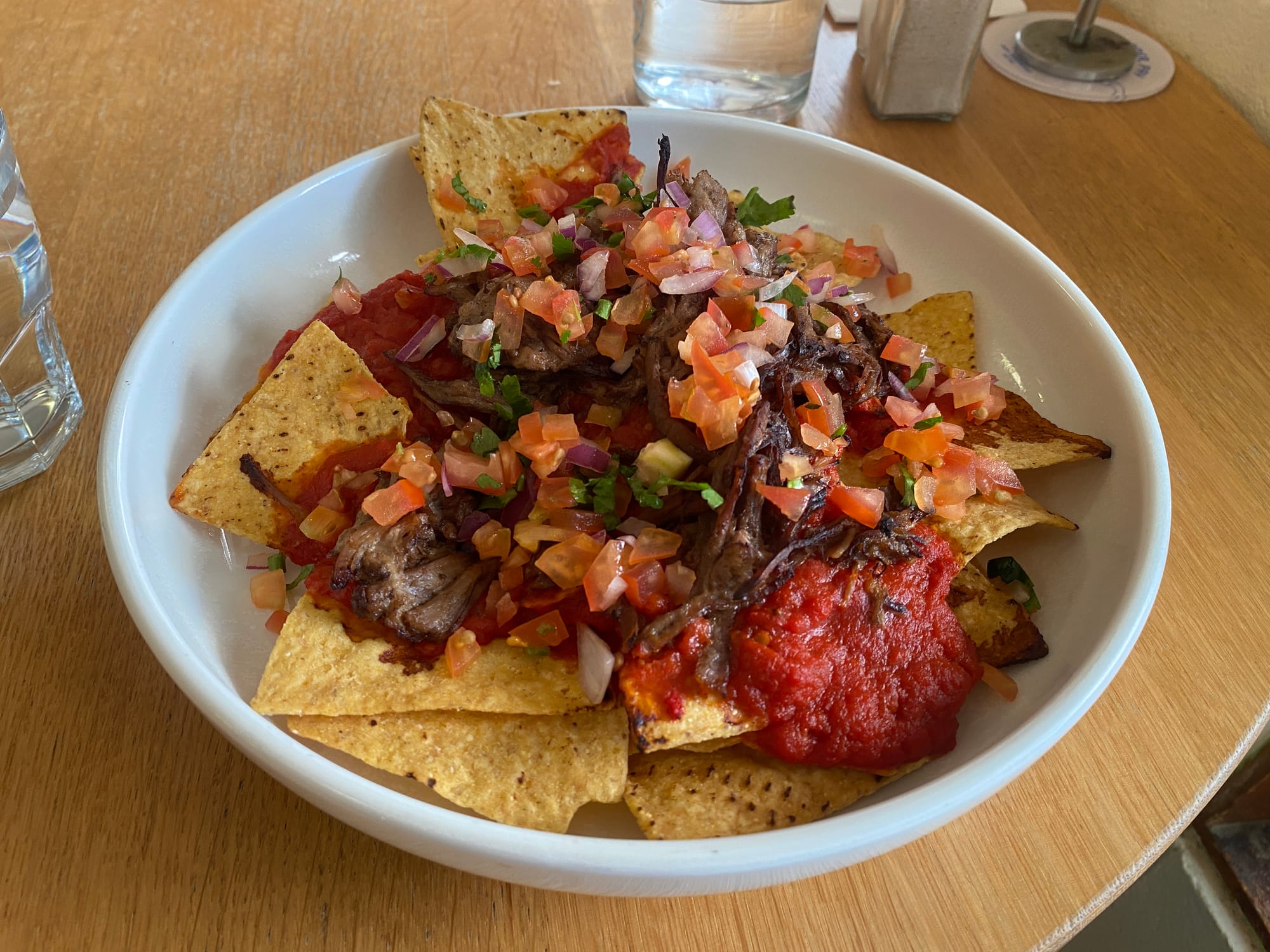Nachos with tomato salsa and pulled BBQ beef served with warm corn chips at the Port Broughton Hotel