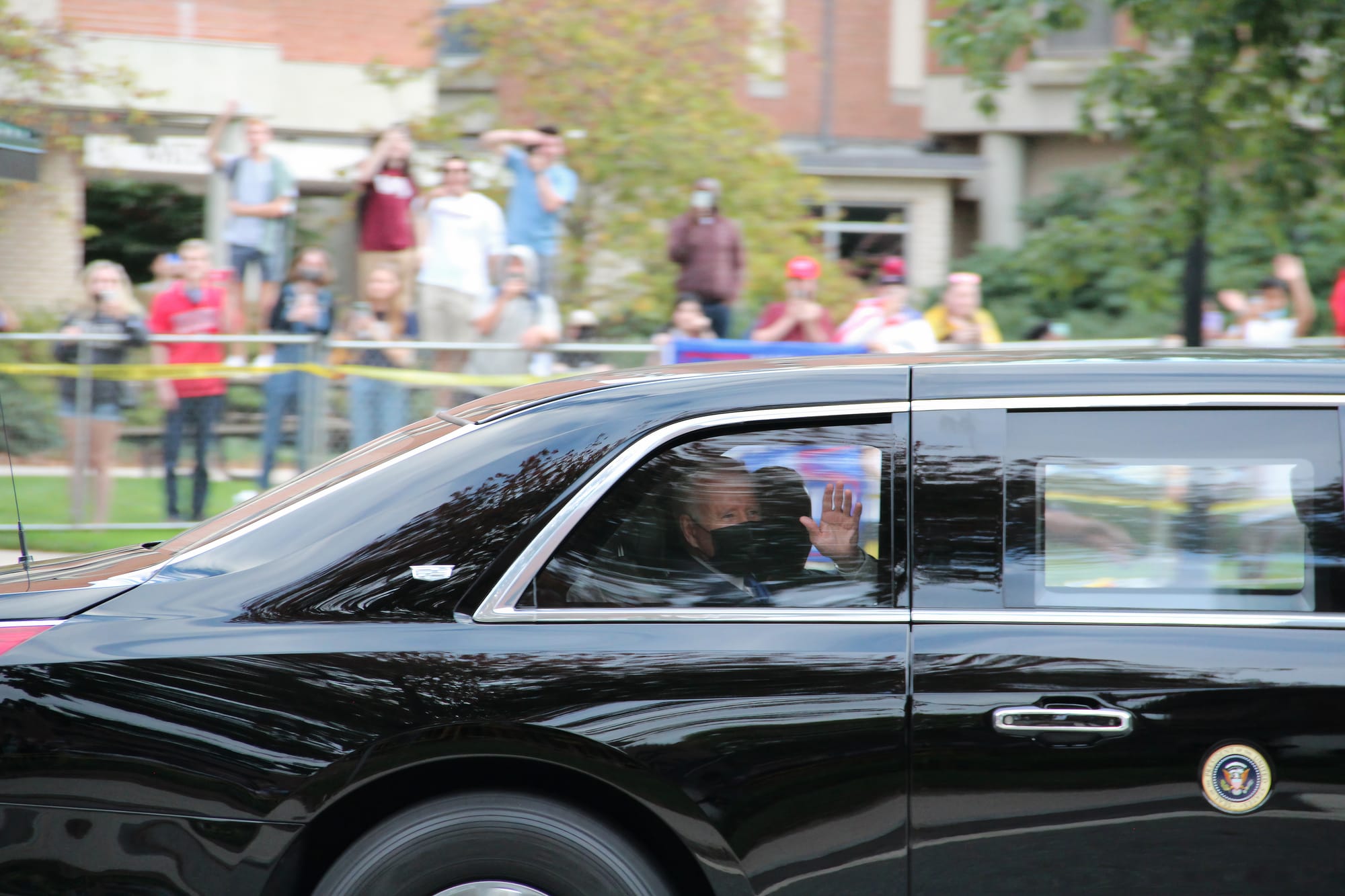 U.S. President Joe Biden waves during a visit to the Dodd Center for Human Rights at the University of Connecticut in Storrs, CT, U.S., Oct. 15, 2021.