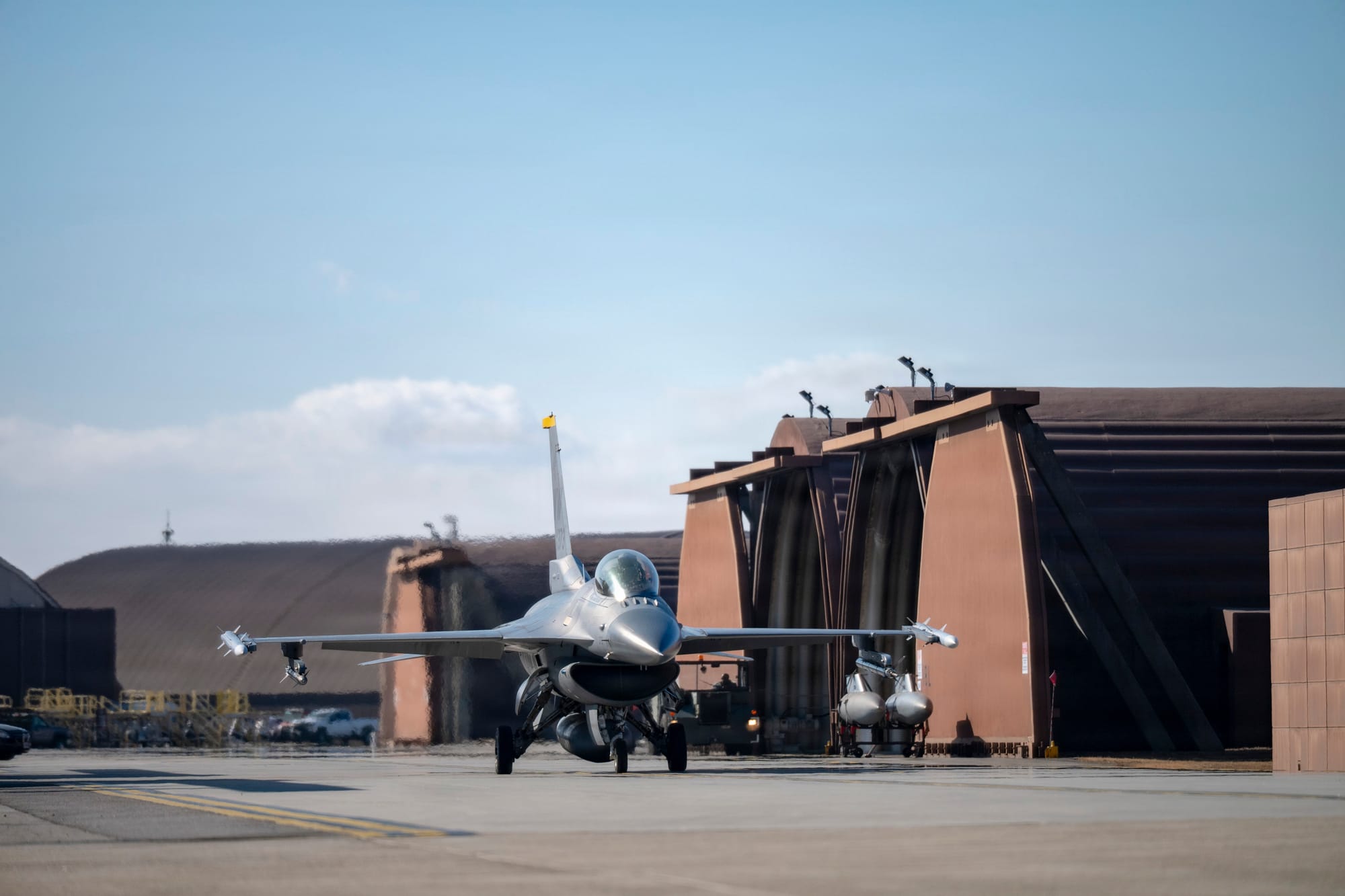 A U.S. Air Force F-16 Fighting Falcon assigned to the 35th Fighter Squadron, taxis to the runway at Osan Air Base, Republic of Korea, Jan. 21, 2026. The flight marked a continuation of Phase II of the Super Squadron test, launching sorties to assess readiness and operational capability. (U.S. Air Force photo by Senior Airman Tallon Bratton)