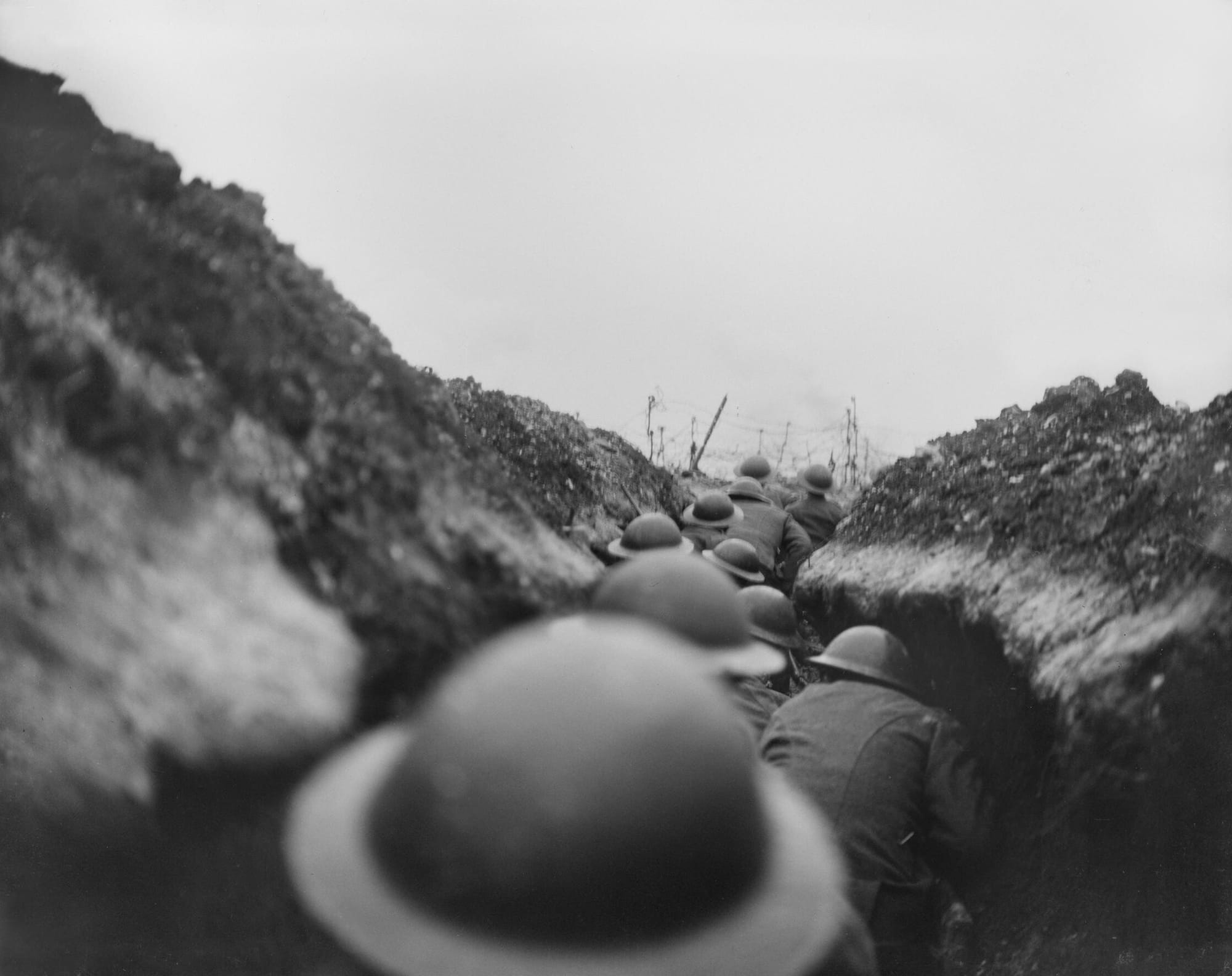 The German Withdrawal To the Hindenburg Line, March-april 1917
A raiding party of the 10th Battalion, Cameronians (Scottish Rifles) waiting in nap for the signal to go. John Warwick Brooke, the official photographer, followed them in the sap, into which a shell fell short killing seven men. Near Arras, 24 March 1917.