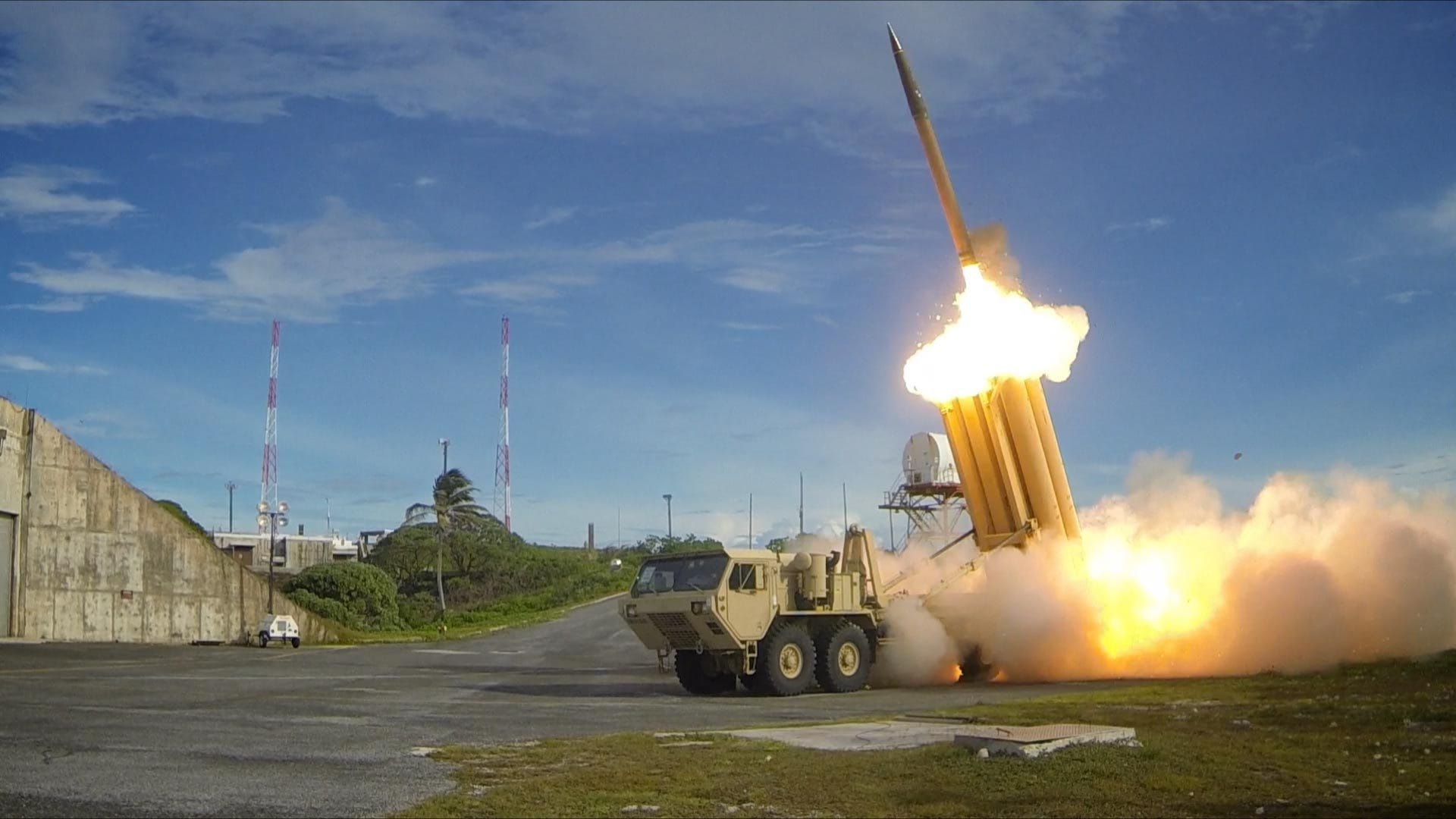 The first of two Terminal High Altitude Area Defense (THAAD) interceptors is launched during a successful intercept test. The test, conducted by Missile Defense Agency (MDA), Ballistic Missile Defense System (BMDS) Operational Test Agency, Joint Functional Component Command for Integrated Missile Defense, and U.S. Pacific Command, in conjunction with U.S. Army Soldiers from the Alpha Battery, 2nd Air Defense Artillery Regiment, U.S. Navy sailors aboard the guided missile destroyer USS Decatur (DDG-73), and U.S. Air Force airmen from the 613th Air and Operations Center resulted in the intercept of one medium-range ballistic missile target by THAAD, and one medium-range ballistic missile target by Aegis Ballistic Missile Defense (BMD). The test, designated Flight Test Operational-01 (FTO-01), stressed the ability of the Aegis BMD and THAAD weapon systems to function in a layered defense architecture and defeat a raid of two near-simultaneous ballistic missile targets